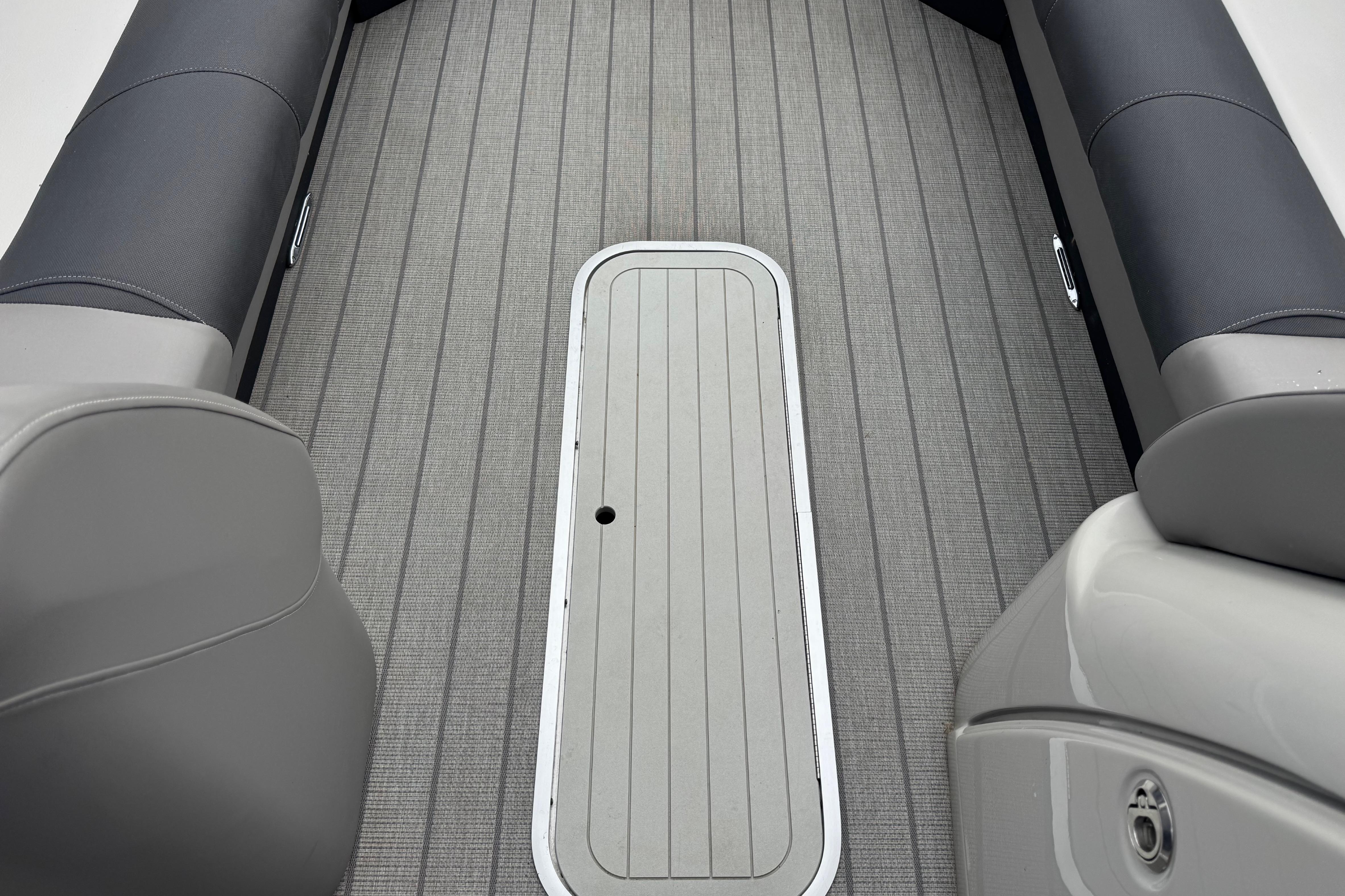 2023 Starcraft MX 25 DL DH boat interior with sleek gray seating and flooring.