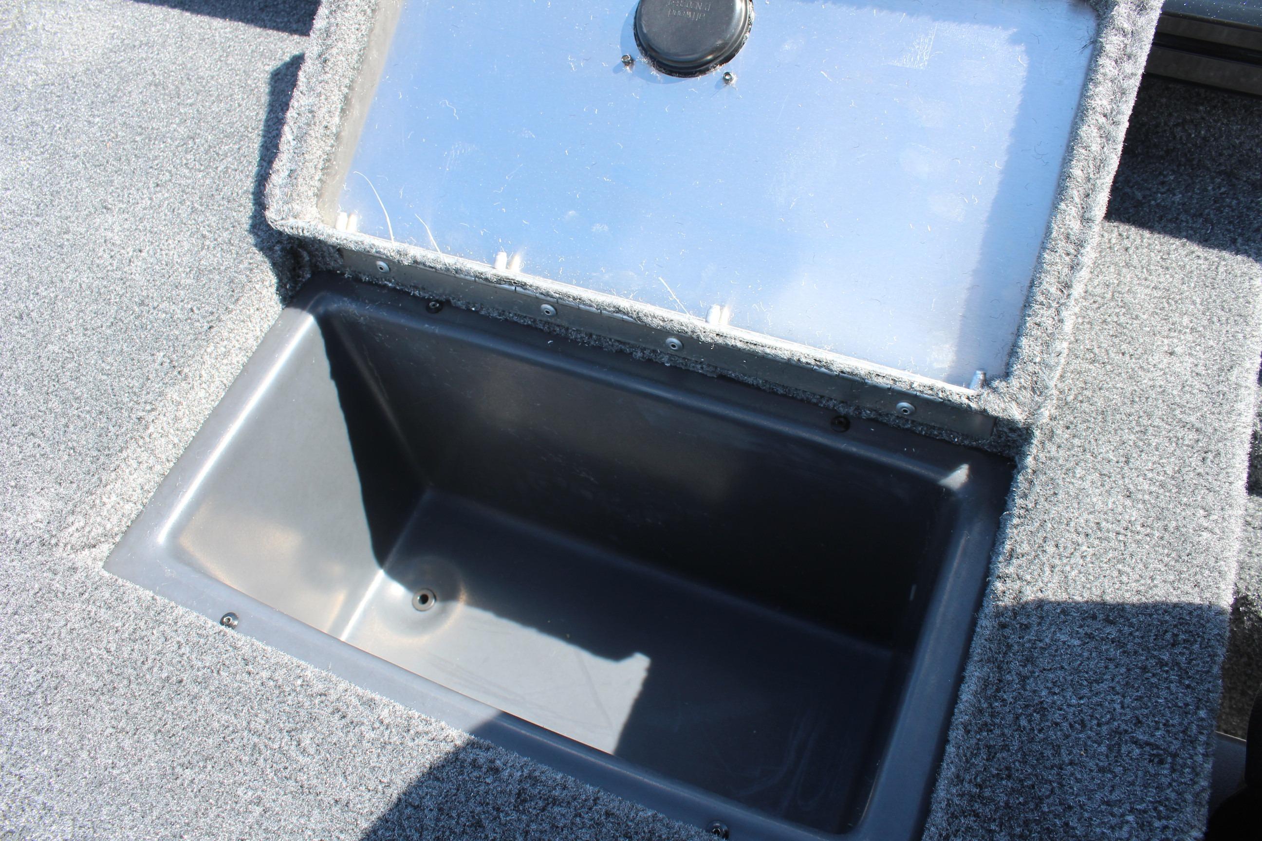 Open storage compartment on 2026 Tracker Pro Team 175 Crappie Edition boat.