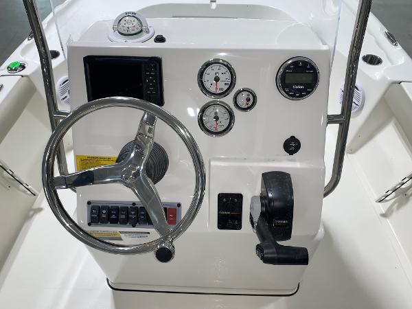 2024 Key West 188 Bay Reef boat console with steering wheel, gauges, and controls.