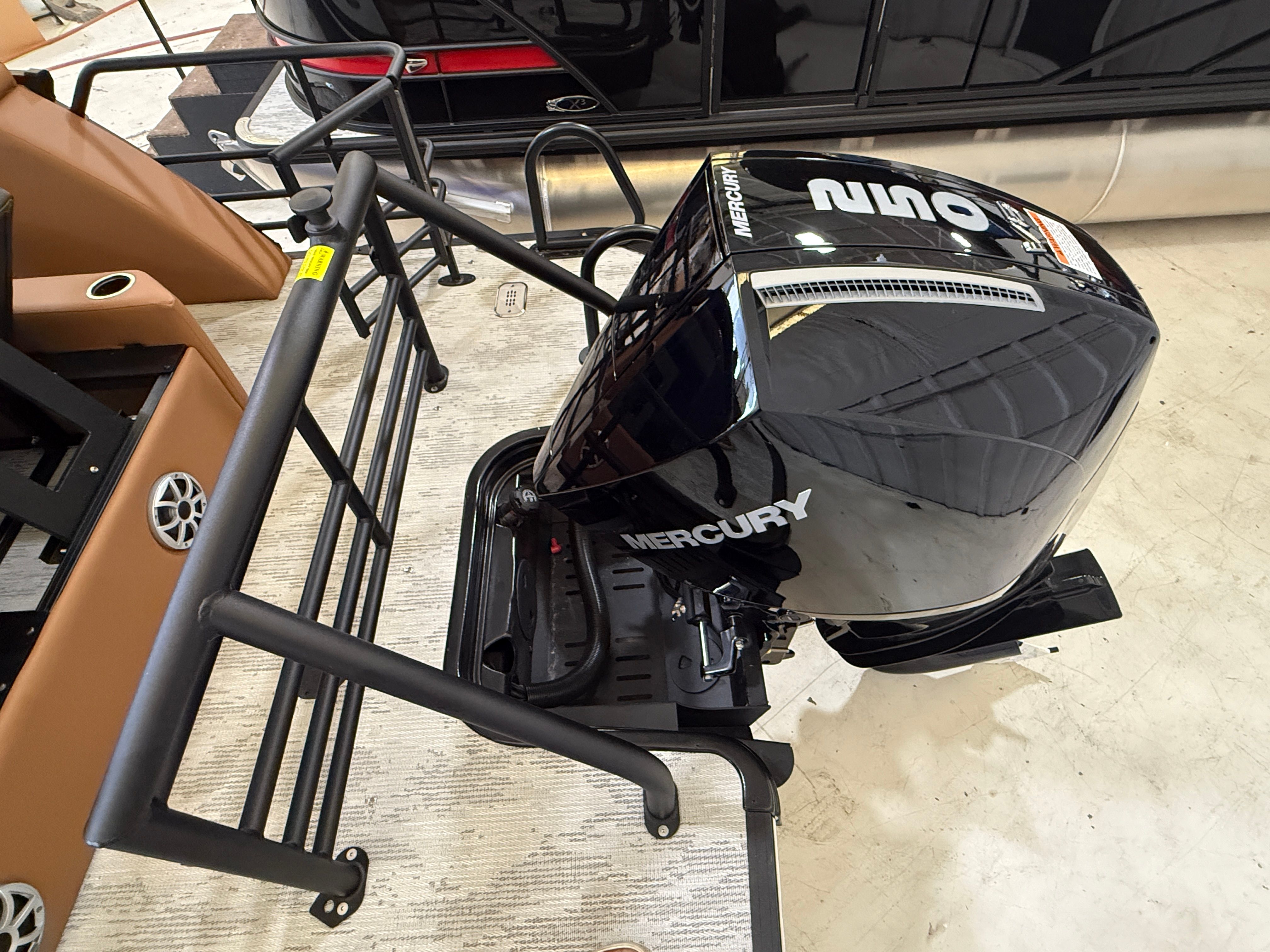 A Mercury outboard motor is mounted on a Sylvan boat.