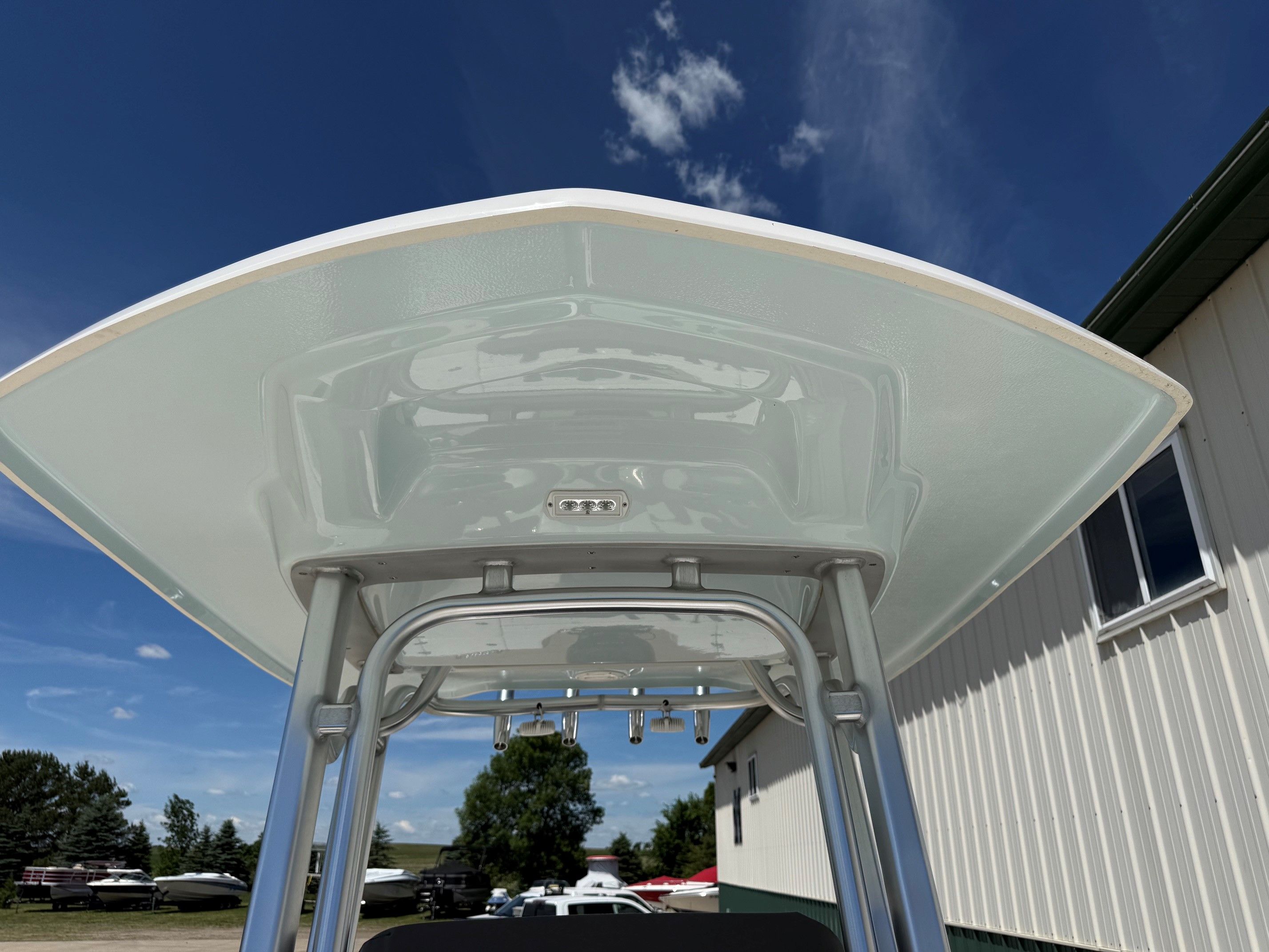 Robalo 226 Cayman 2021 boat roof under blue sky.