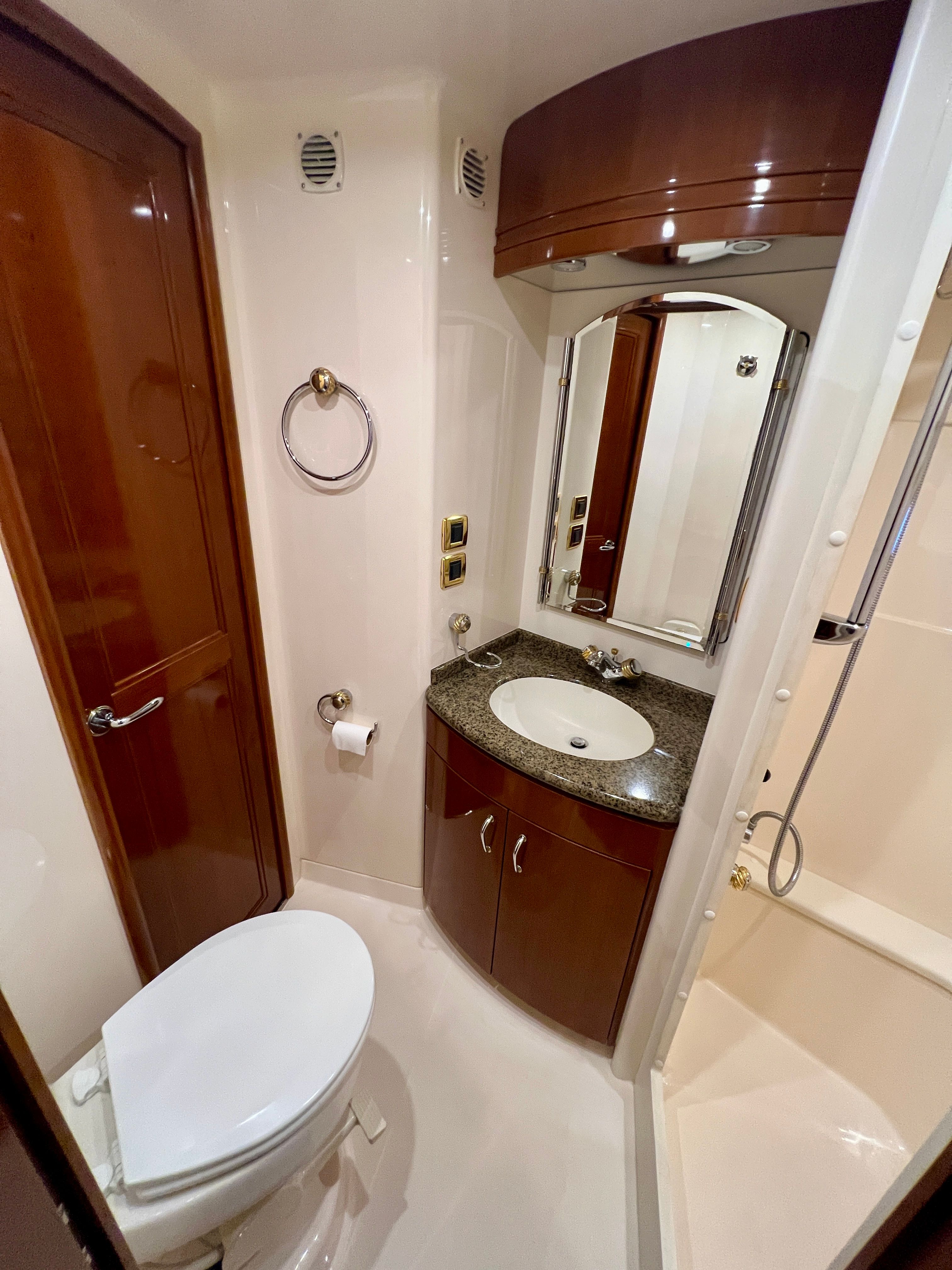 Luxurious bathroom in a 2005 Carver 560 Voyager Sky yacht.