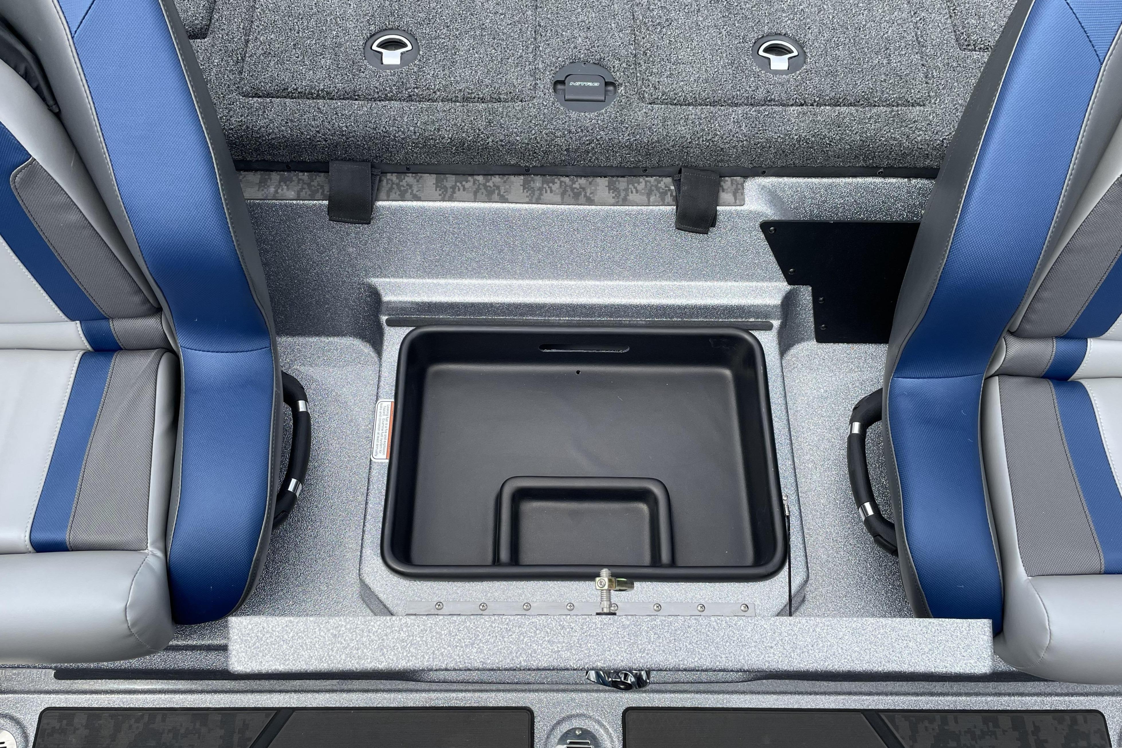 Interior of 2026 Nitro Z21 XL with blue seats and storage compartment.