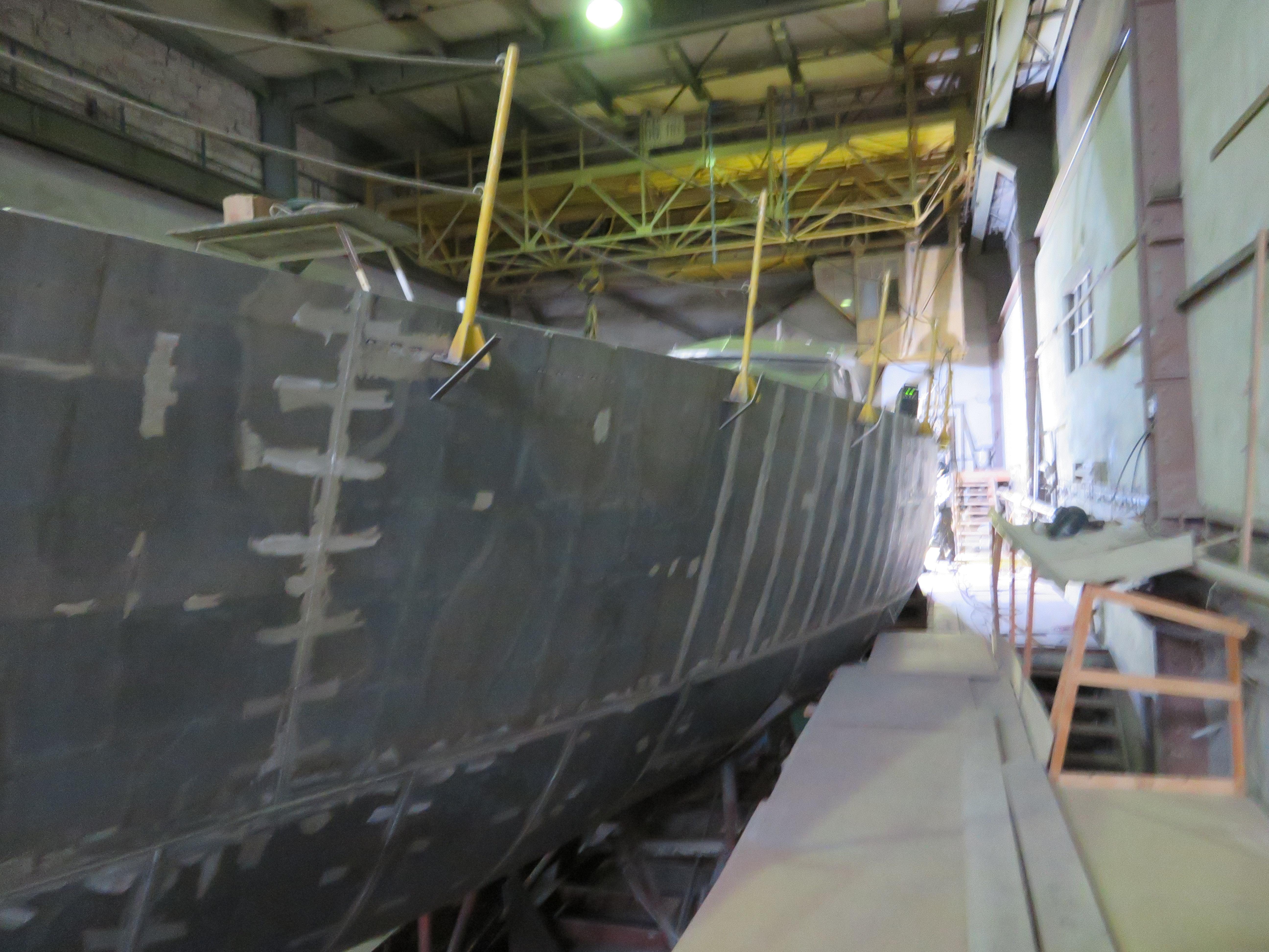2024 Van De Stadt 67 DS yacht under construction in a shipyard.