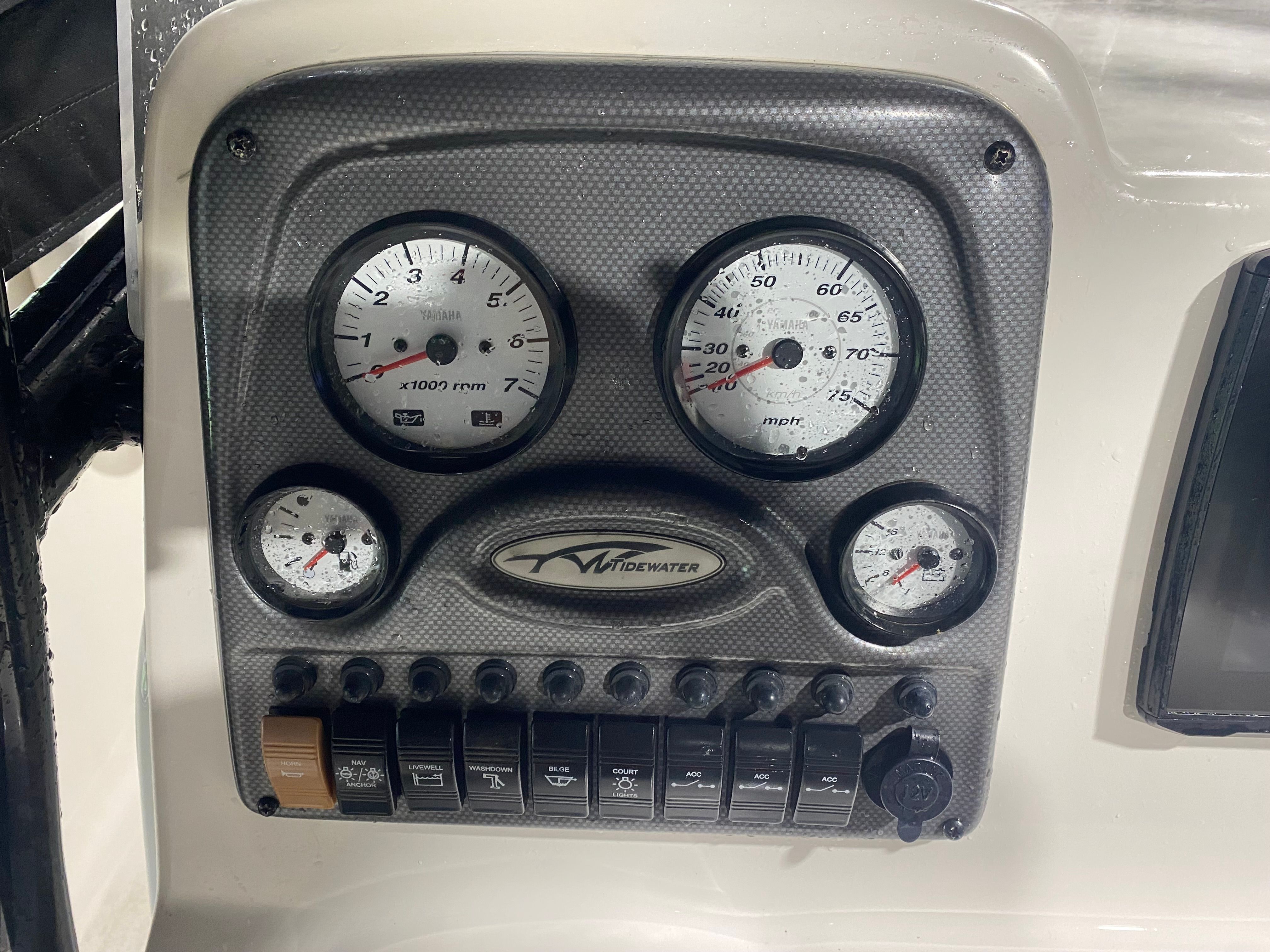 Dashboard of a 2015 Tidewater 220 CC Adventure boat.