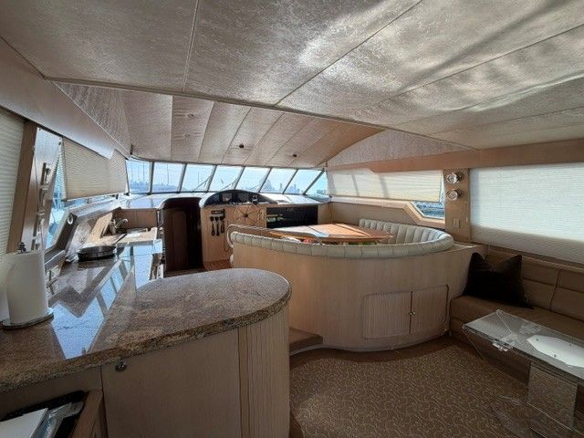 Interior of a 1990 custom motor yacht with elegant furnishings.