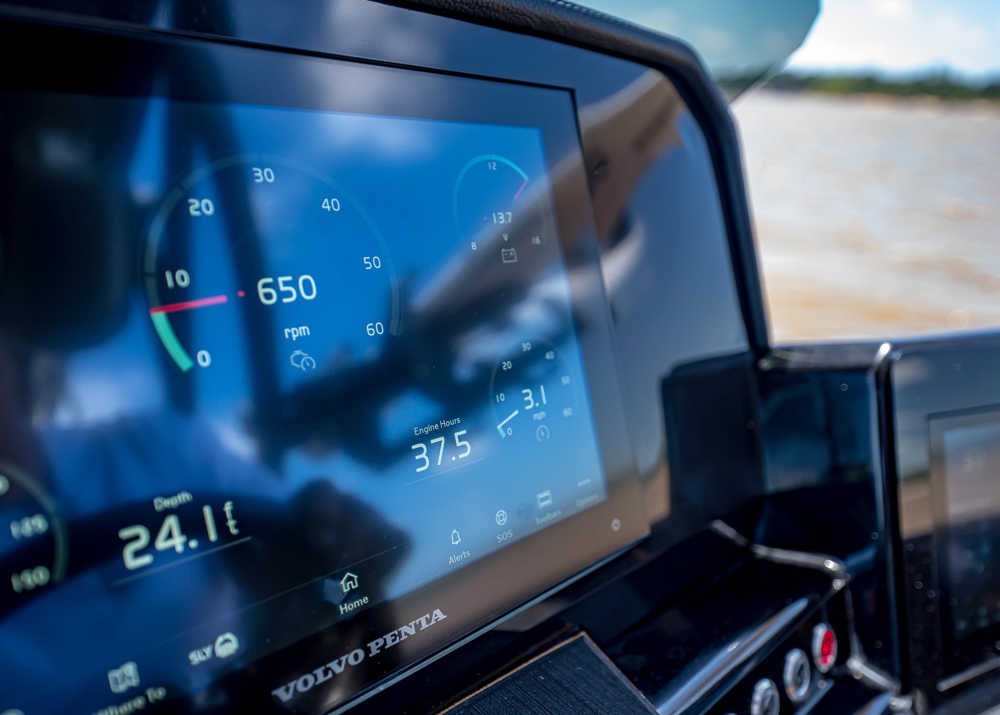 Digital dashboard display on a Paradigm 236, 2025 model, showing engine metrics.