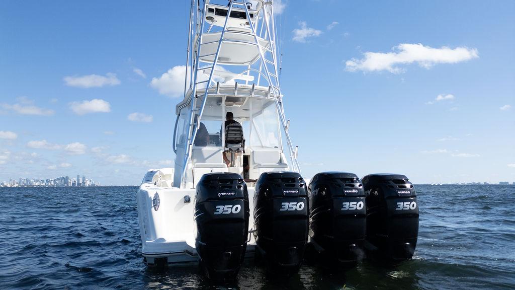 2015 SeaVee 430 Fisharound boat with four powerful engines on open water.