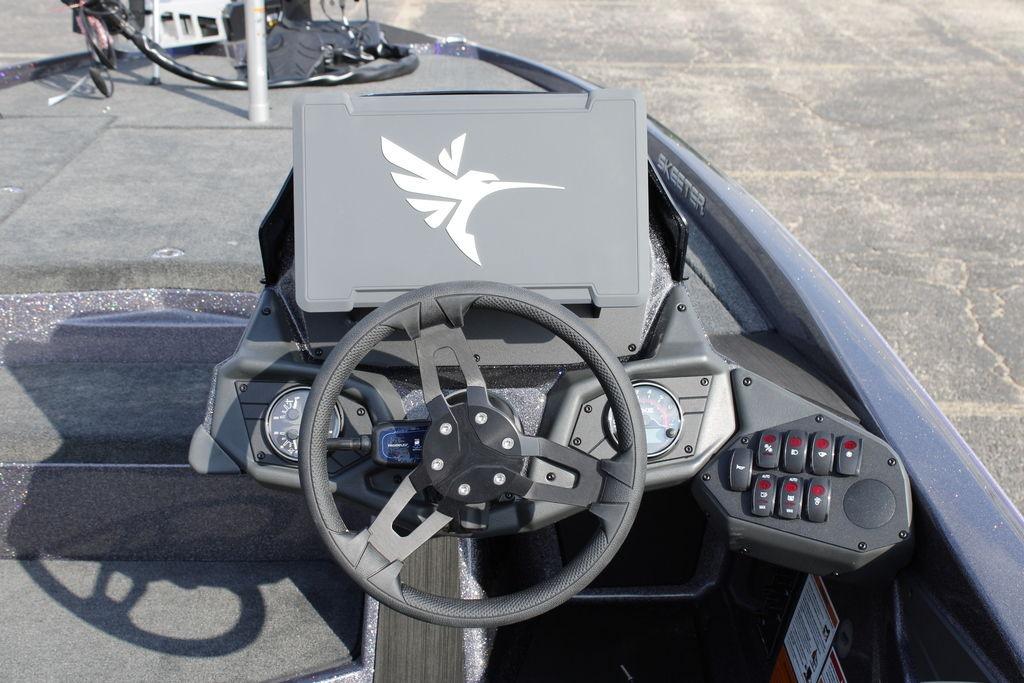 2026 Skeeter ZXE21 boat dashboard with steering wheel and control panel.