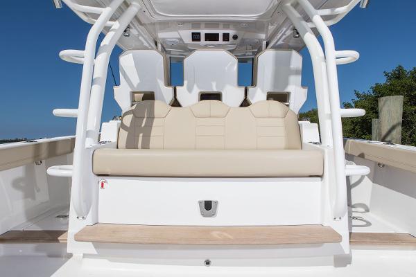 Manufacturer Provided Image: 2018 Pursuit S 368 Sport boat with beige seating and white frame.