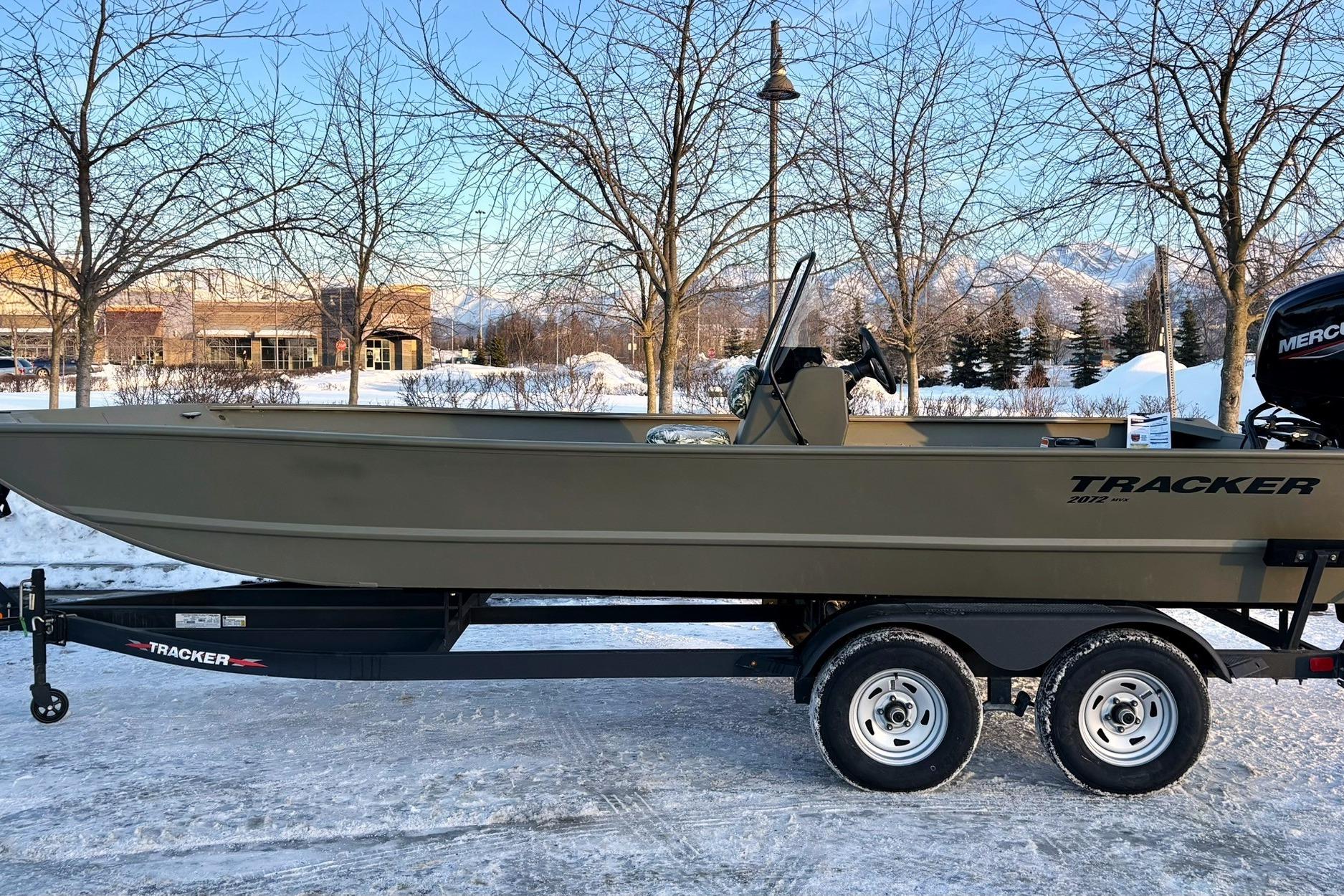 2024 Tracker Grizzly 2072 CC boat on trailer in winter.