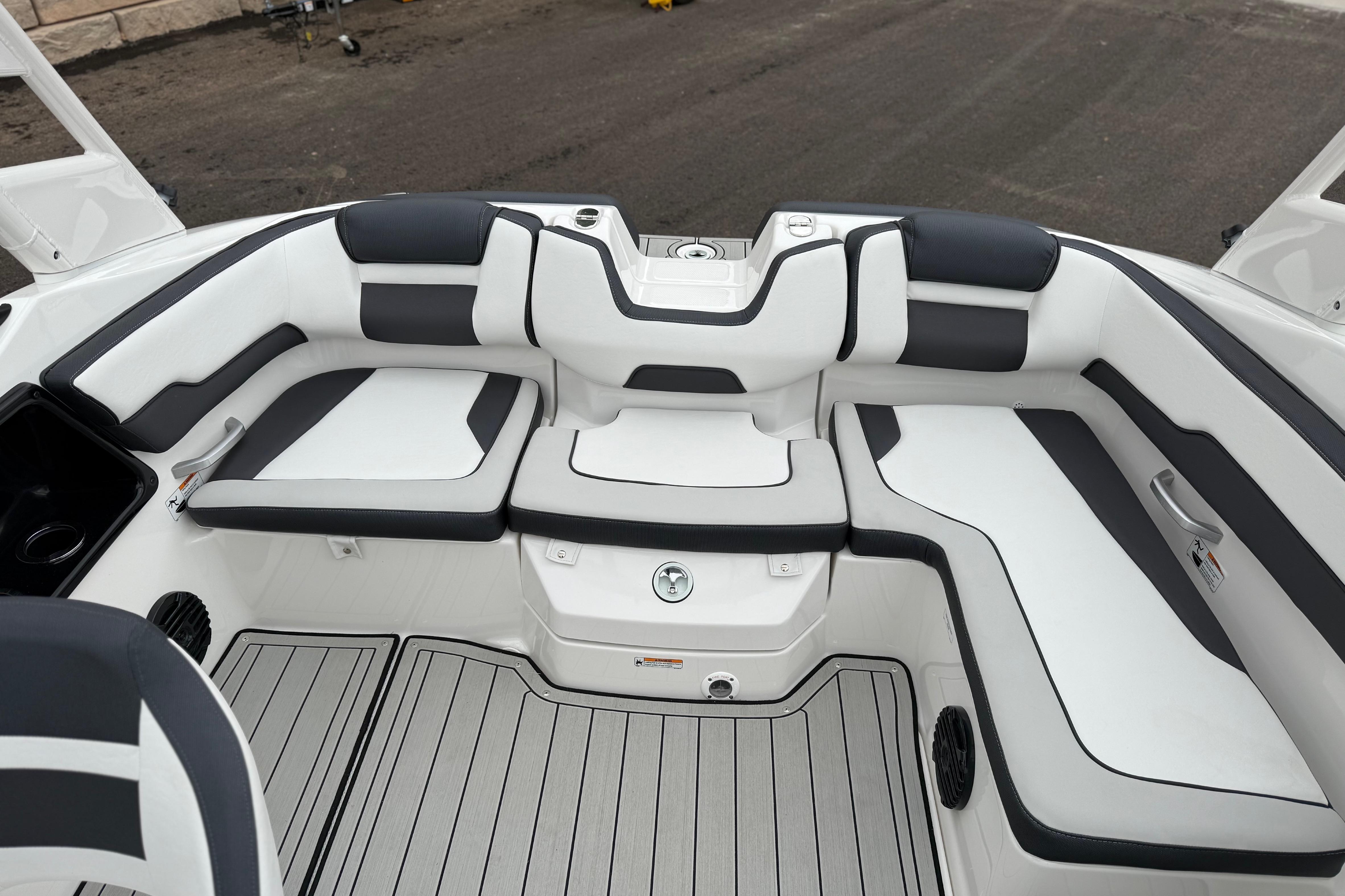 2025 Yamaha Boats 195S interior with sleek white and black seating design.