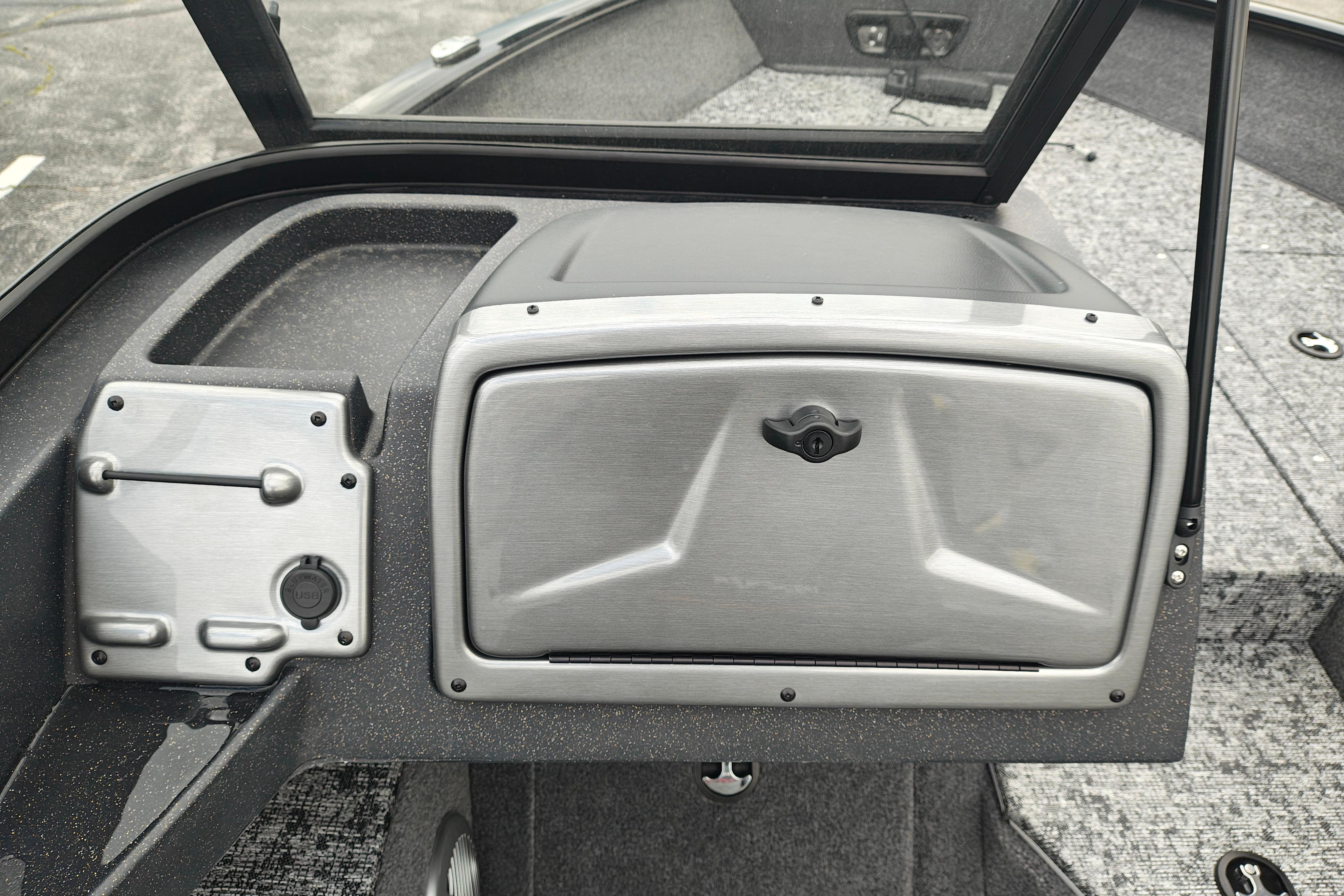 2026 Tracker Pro Guide V-175 WT boat dashboard with storage compartment and USB port.