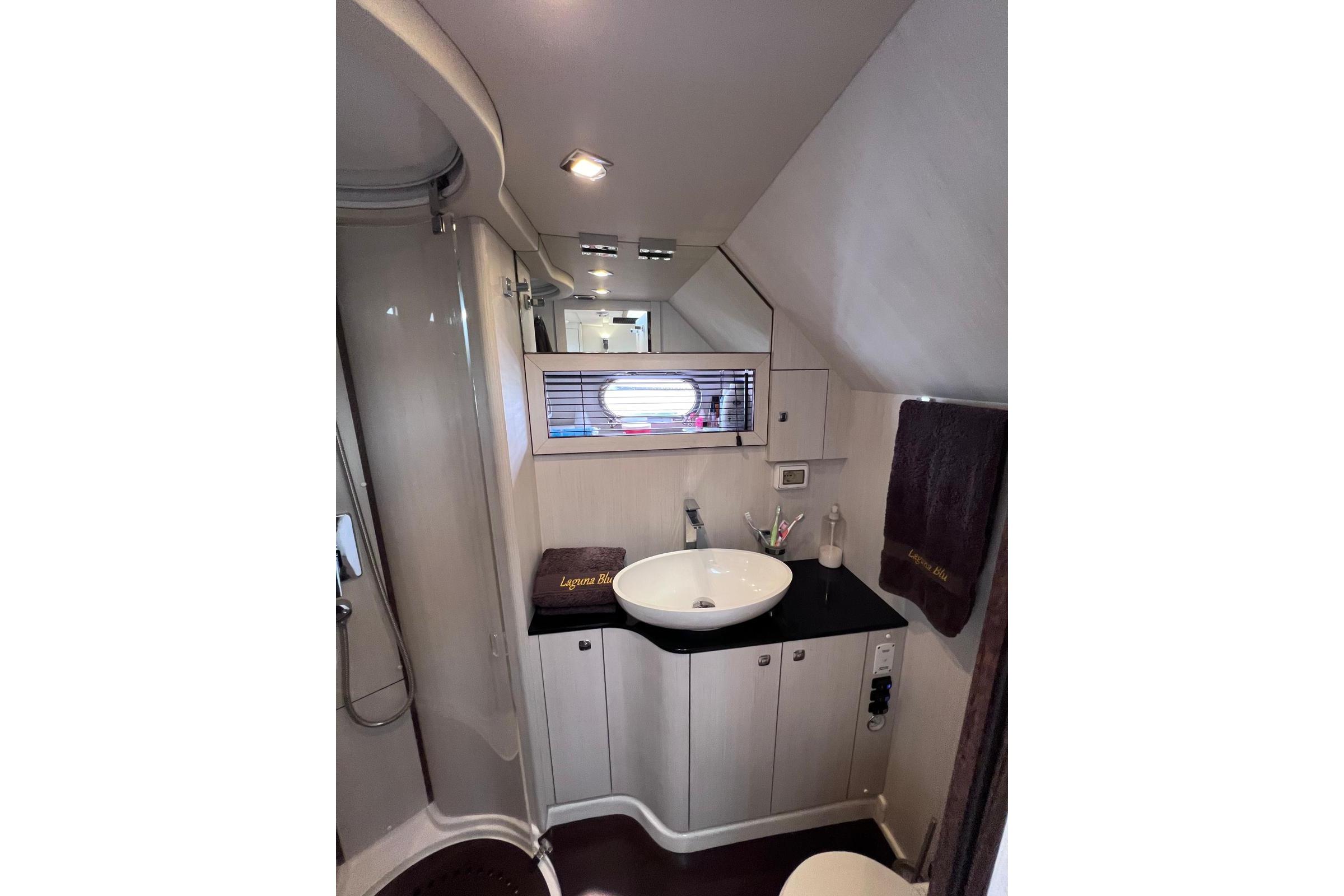 Luxurious bathroom in 2014 Solemar 44.1 Oceanic yacht with modern fixtures.