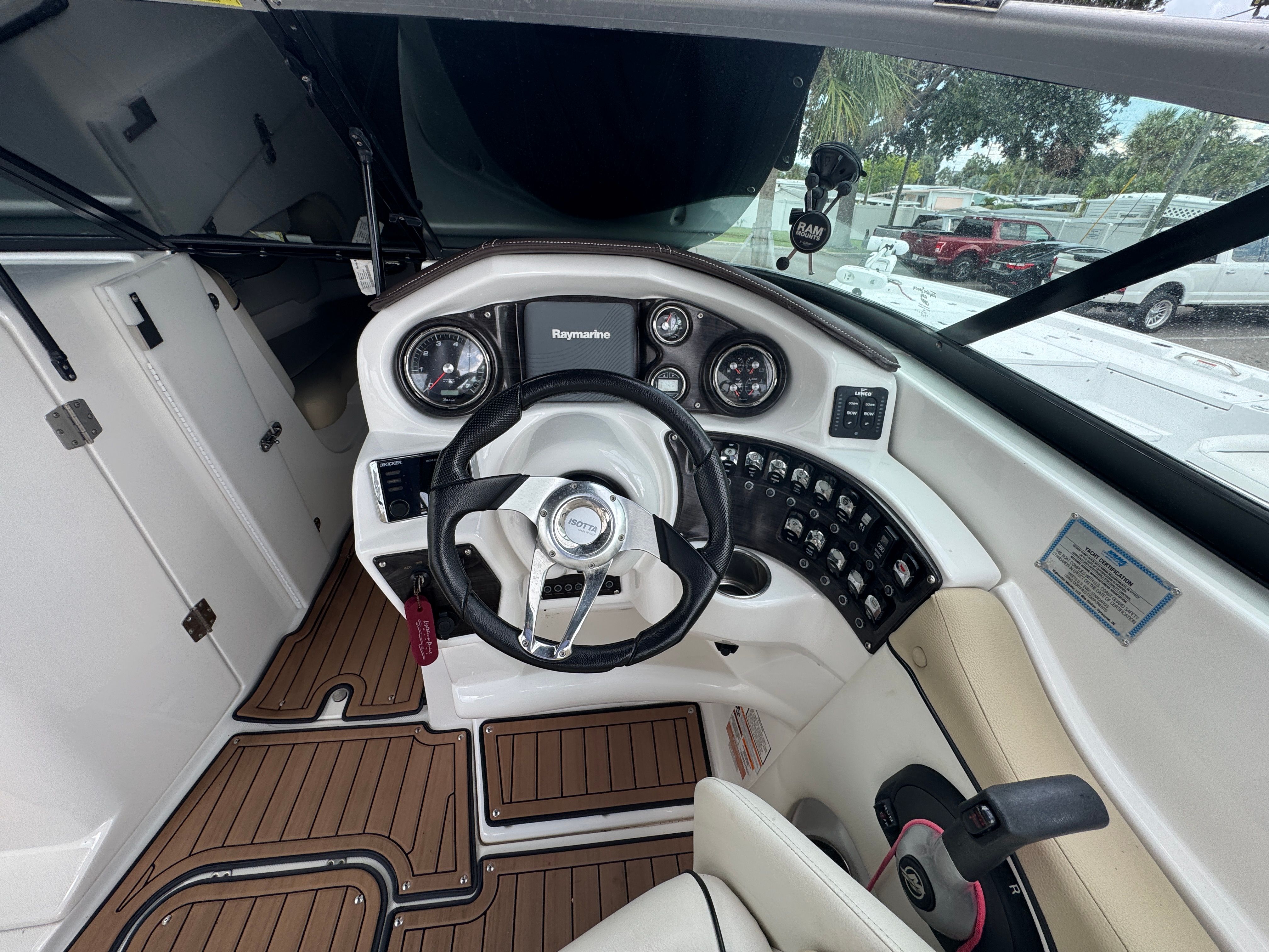 Interior view of 2017 Rinker QX29 BR boat cockpit.