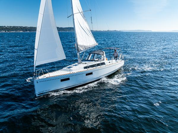 2021 Beneteau Oceanis 38.1 sailboat cruising on open water.