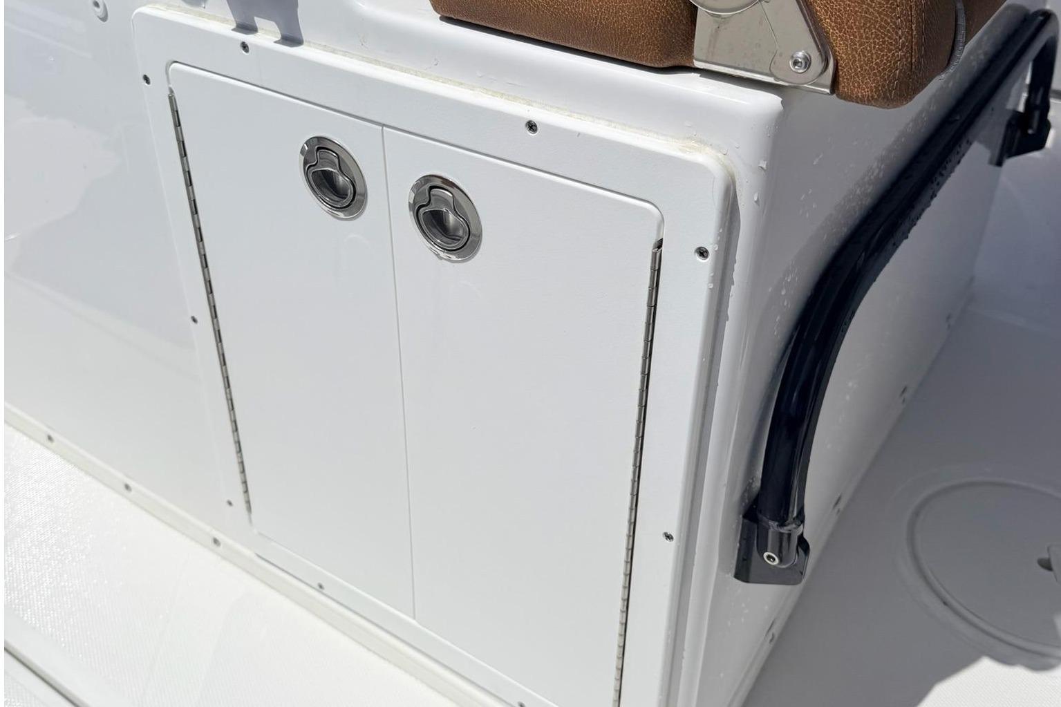 Sea Hunt Ultra 305 Coffin Box 2026, white boat cabin.