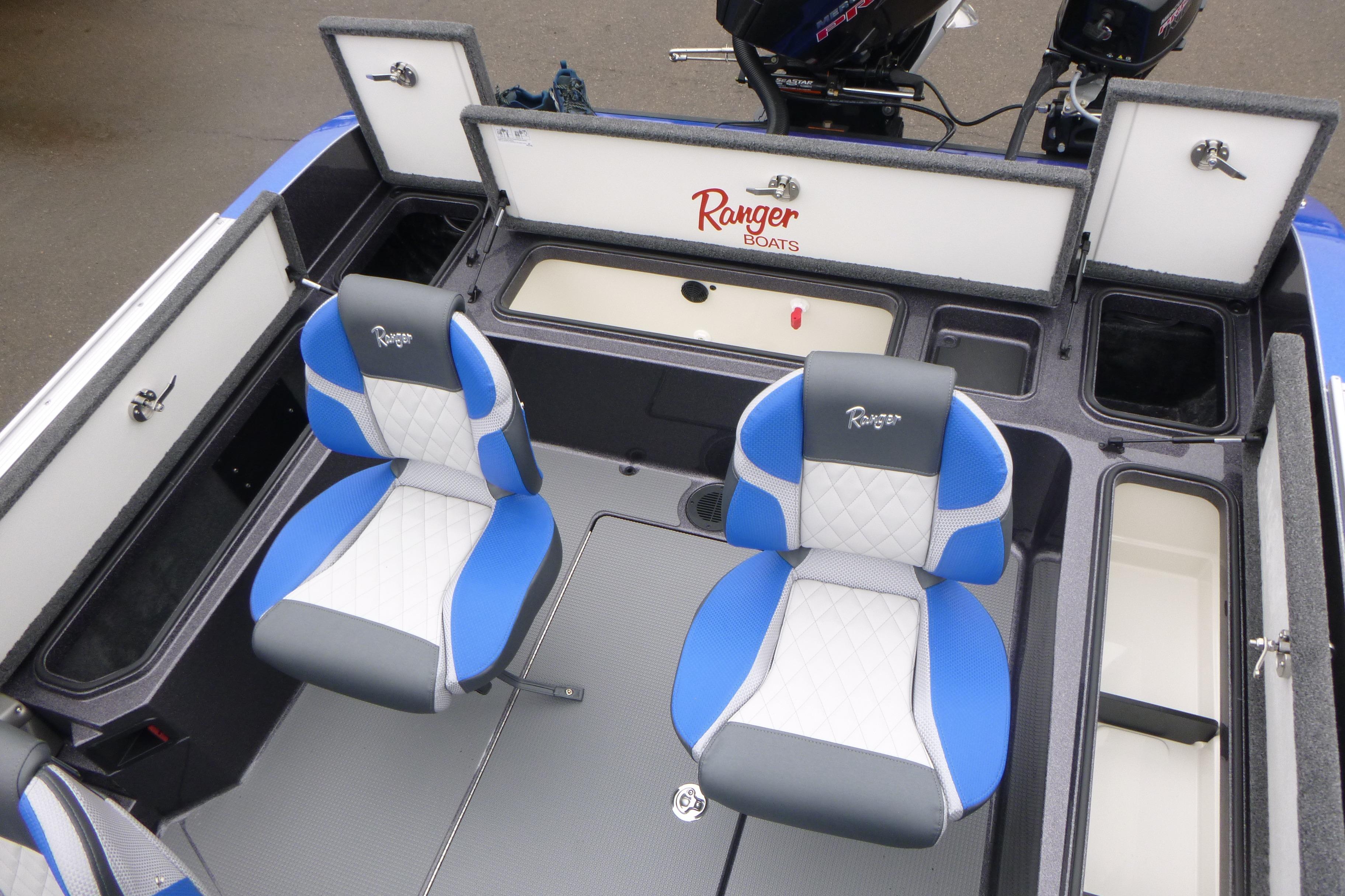 2026 Ranger 620FS Cup Equipped boat interior with blue and white seats.