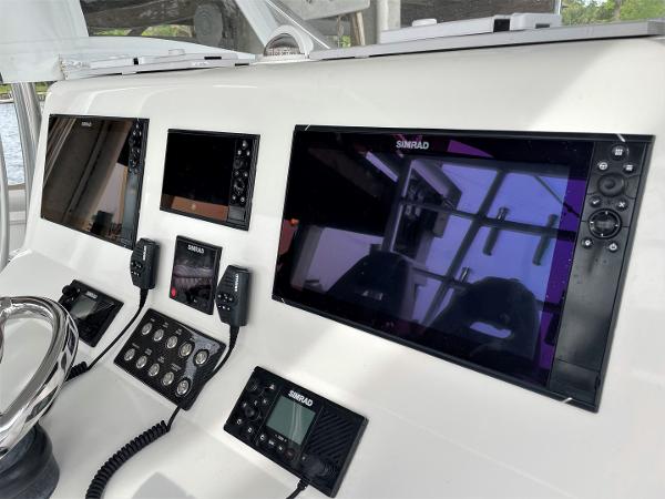 Control panel of 2020 Front Runner 39 Center Console with Simrad displays and controls.