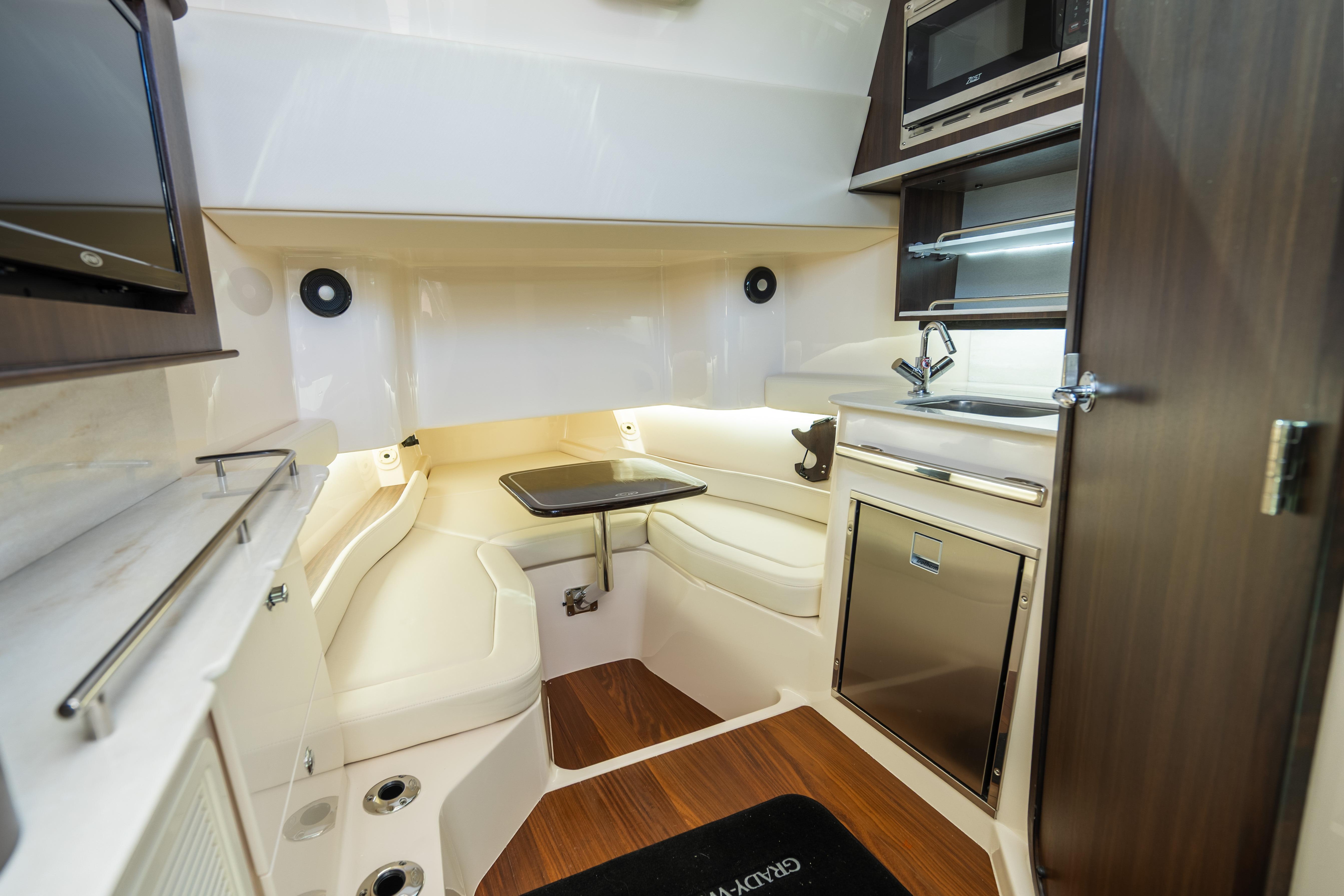 Luxurious interior of 2025 Grady-White Canyon 386 boat with modern amenities.