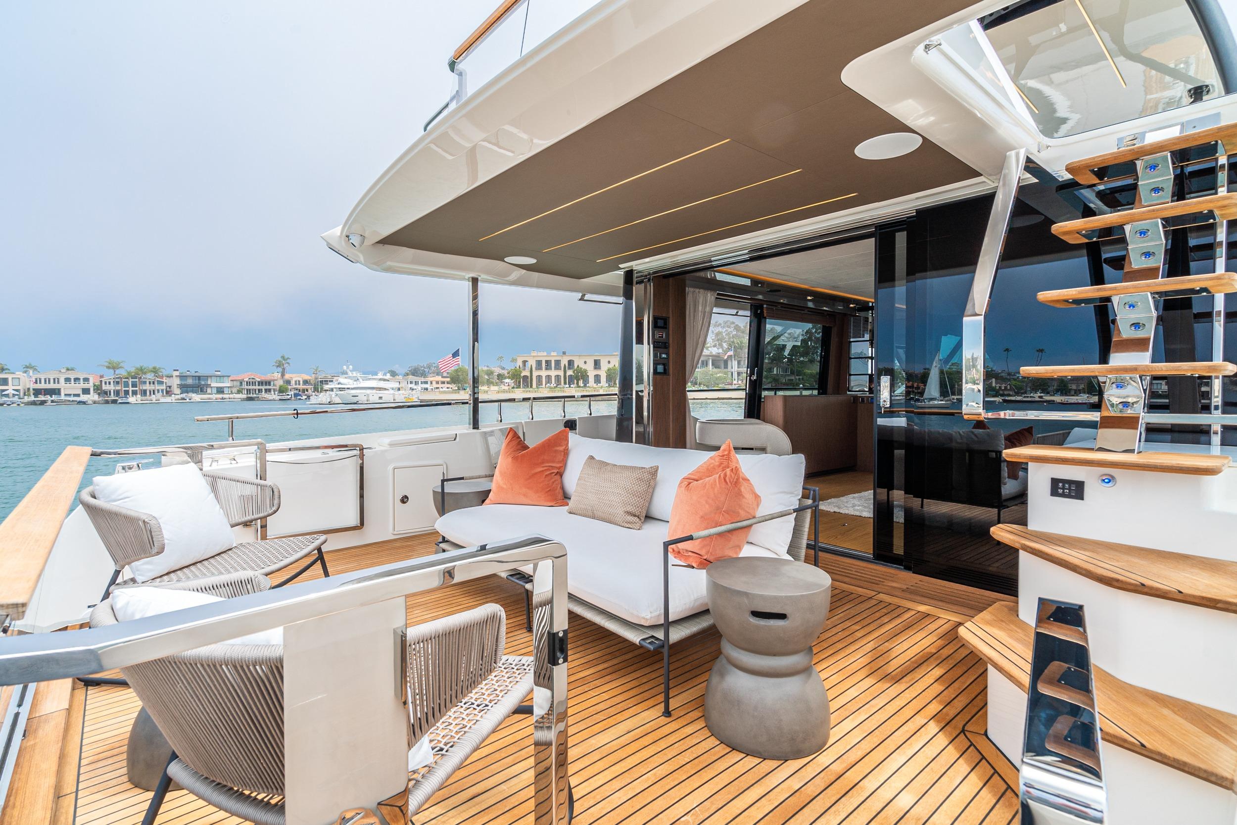 Luxurious 2024 Prestige X60 yacht deck with modern seating and elegant design.