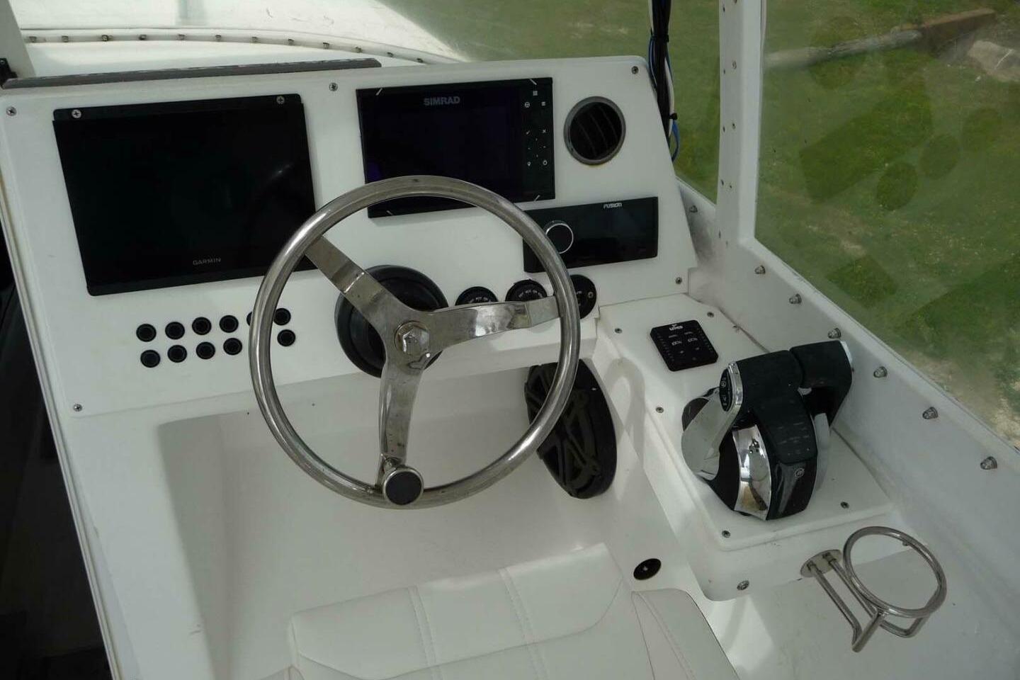 Helm console of a 2011 Wellcraft 30 Scarab Sport boat.