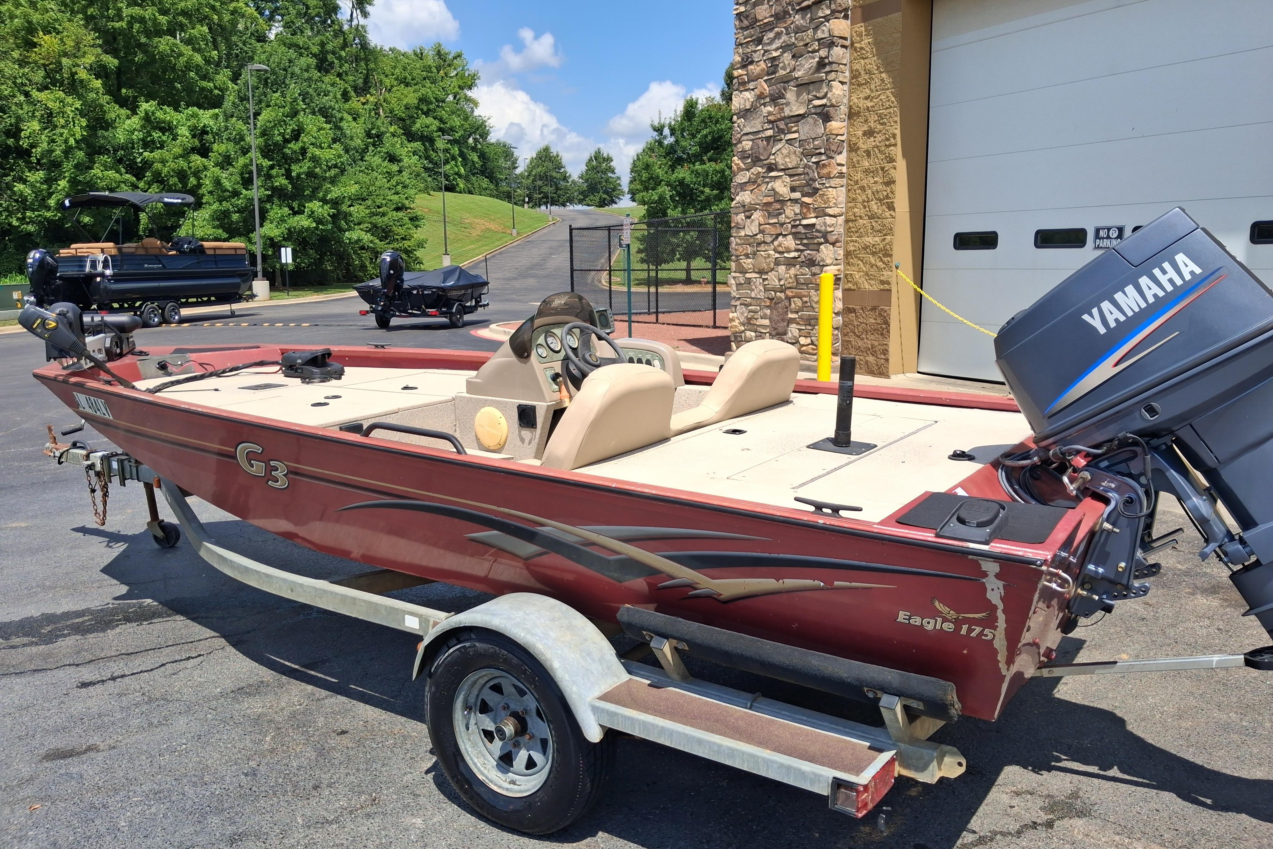 2008 G3 Eagle 175 boat with Yamaha motor on trailer, parked outdoors.