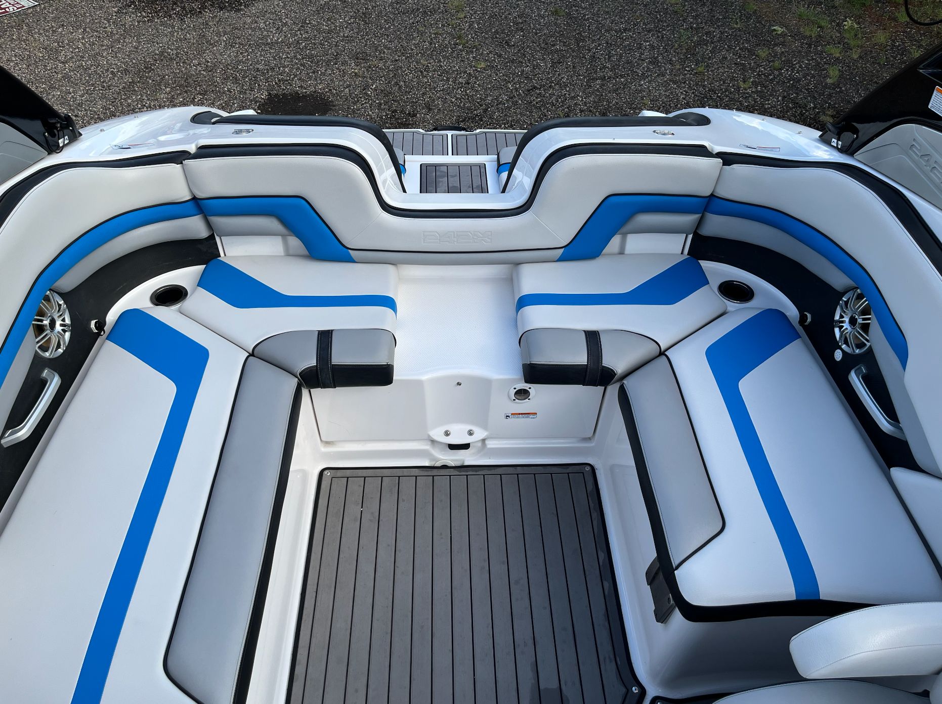 Interior of a 2017 Yamaha Boats 242X E-Series with blue accents.