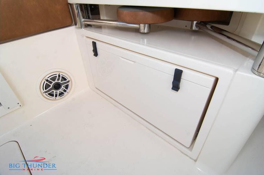 2022 Scout 350 LXZ boat interior with storage compartment and speaker.