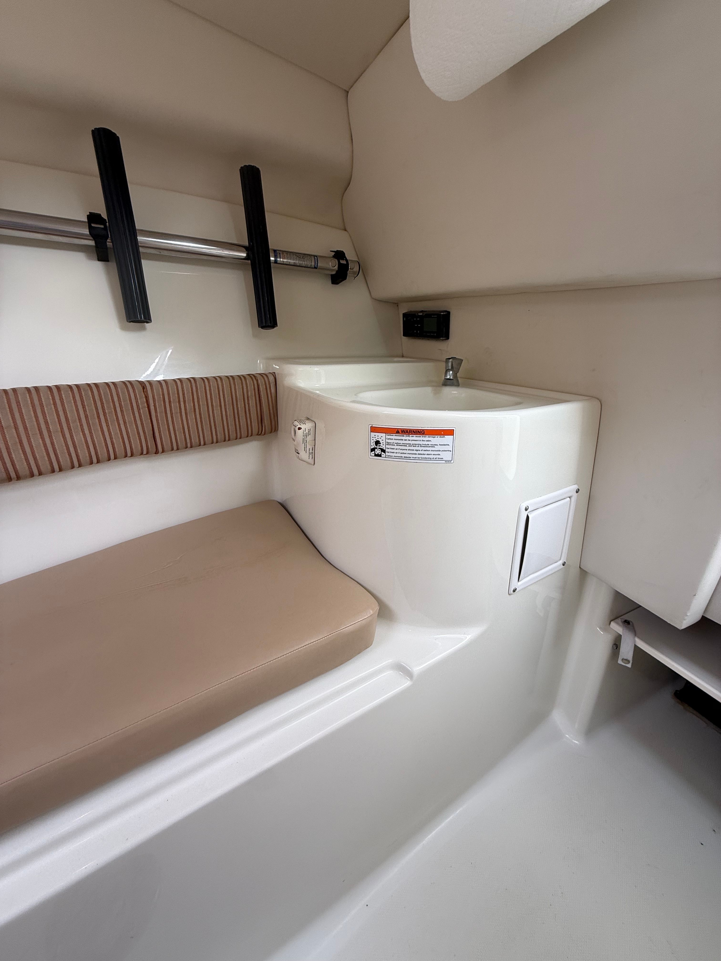 Interior of 2008 Hydra-Sports Vector 2200 VX with seat and sink.