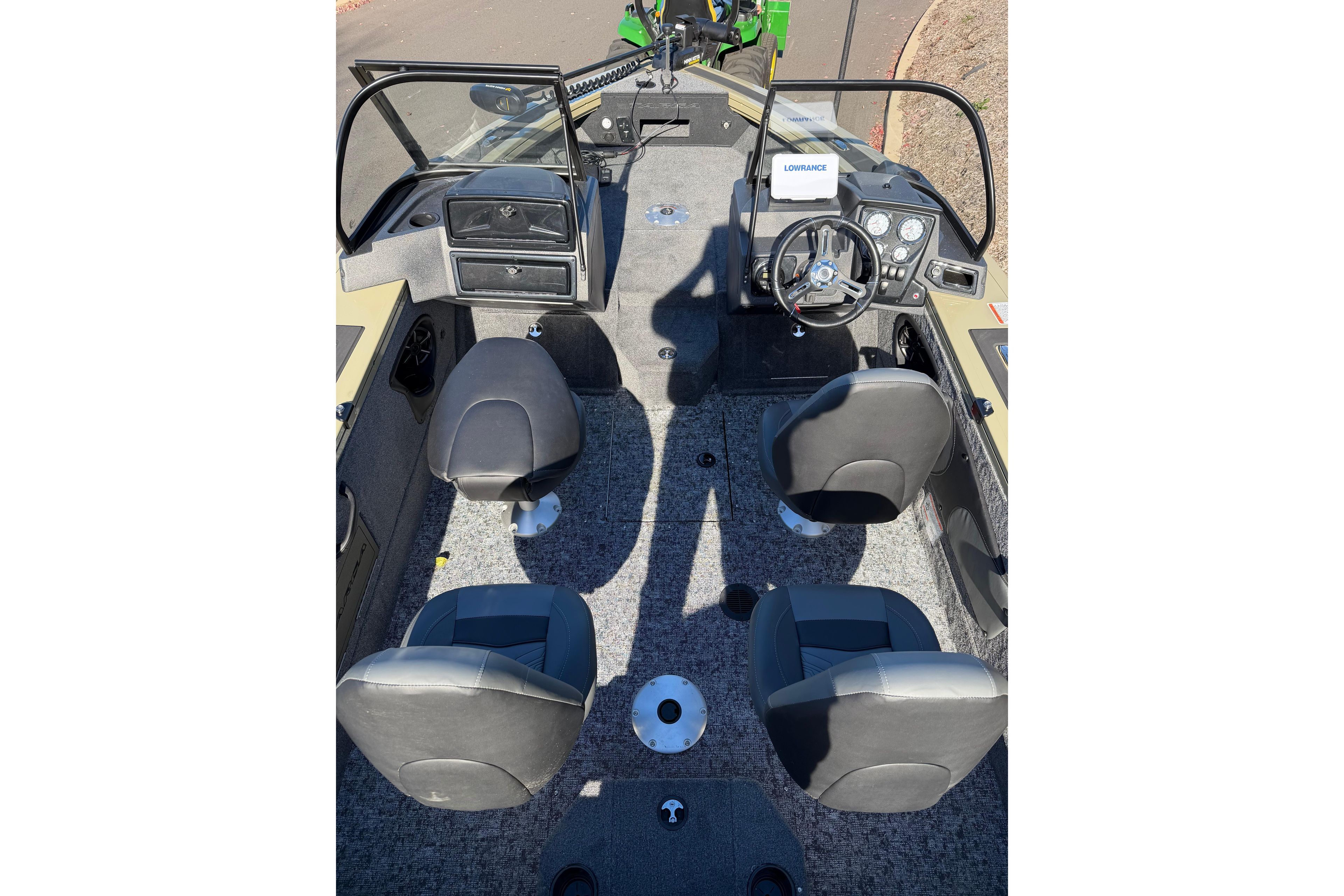 2026 Tracker Targa V-19 Combo boat interior with four seats and steering console.