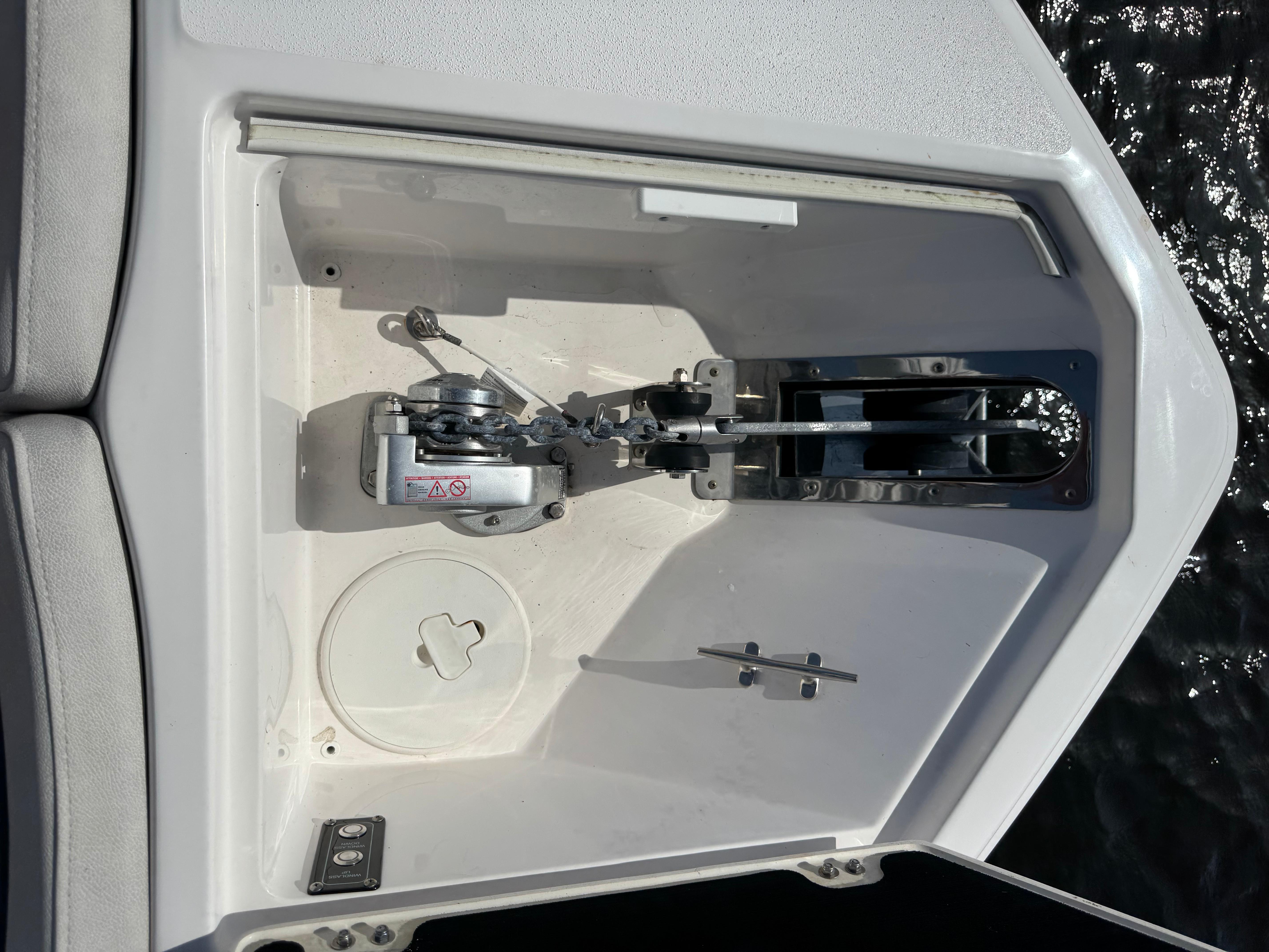 Anchor compartment of 2023 Sea Fox 268 Commander boat, featuring a winch and cleat.