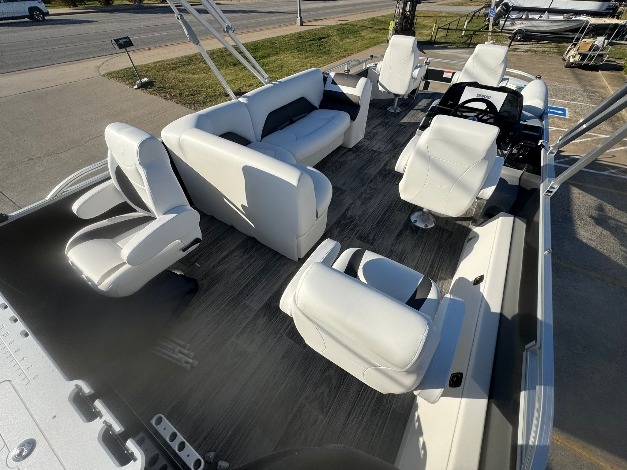 Interior of 2026 Landau 23C Atlantis with luxurious white seating.