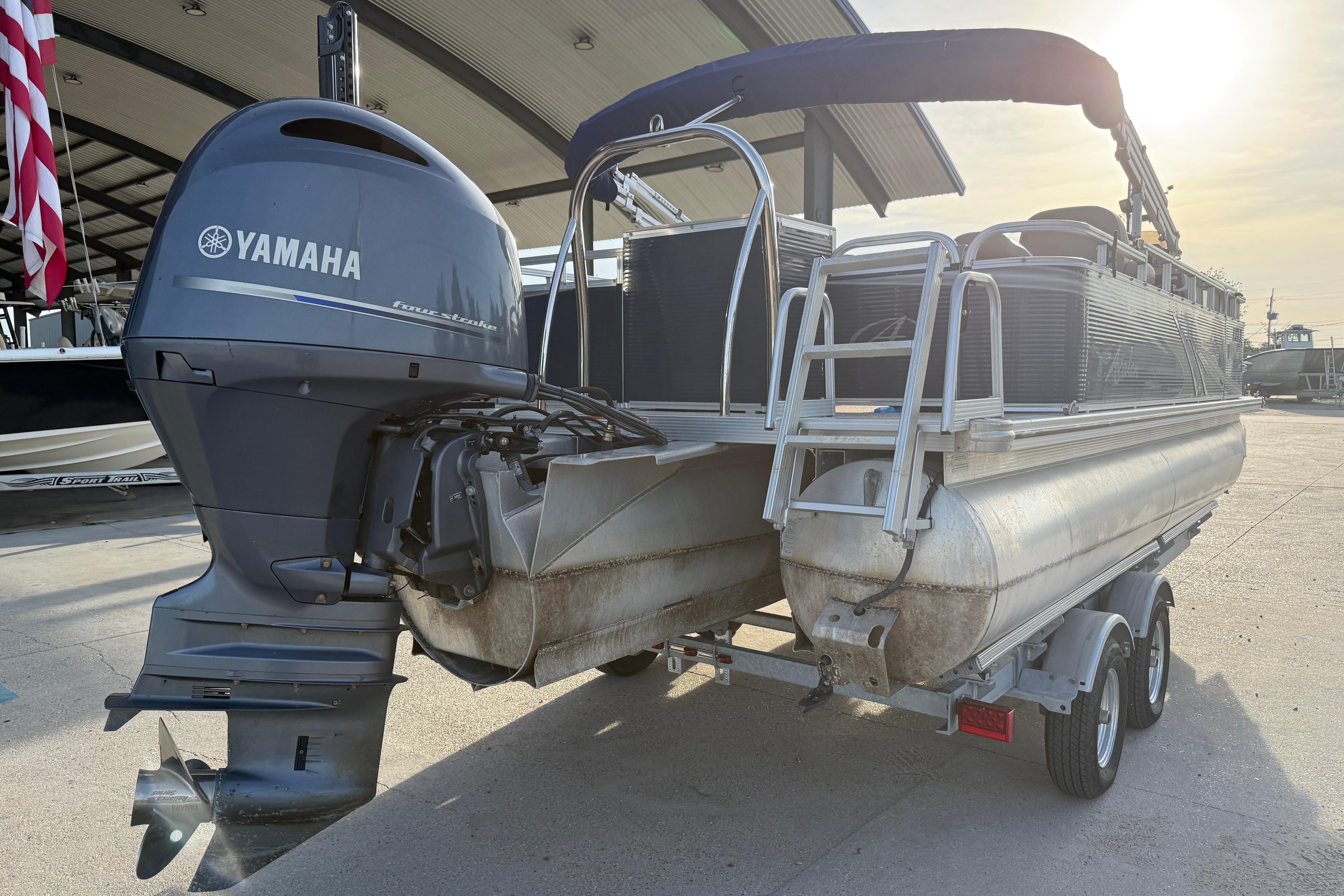 2019 Avalon Venture Fish N Cruise 20' pontoon boat with Yamaha outboard motor.