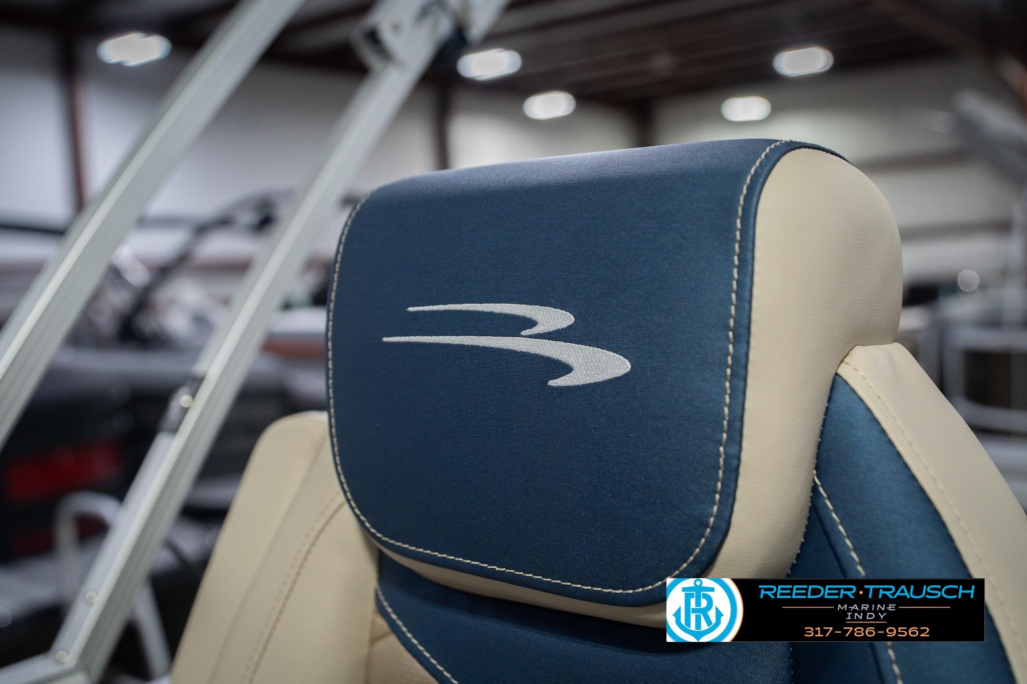 2026 Bennington 21 SLJ boat seat with logo, showcased at Reeder-Trausch Marine Indy.