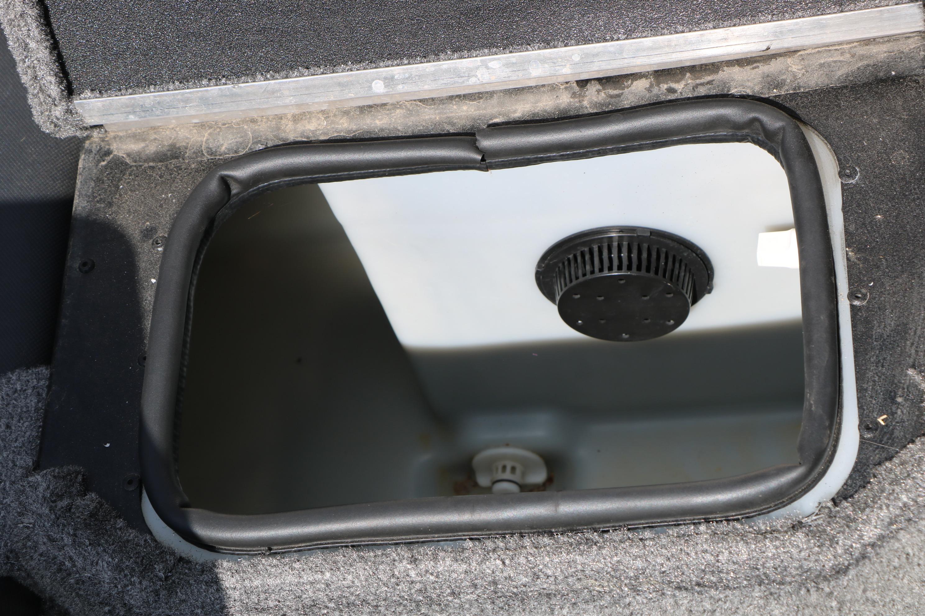 Open storage compartment in 2023 Alumacraft Competitor FSX 185 boat.