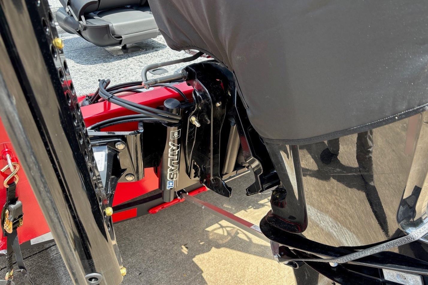 2026 Tracker Pro Team 190 TX boat motor and hydraulic system close-up.