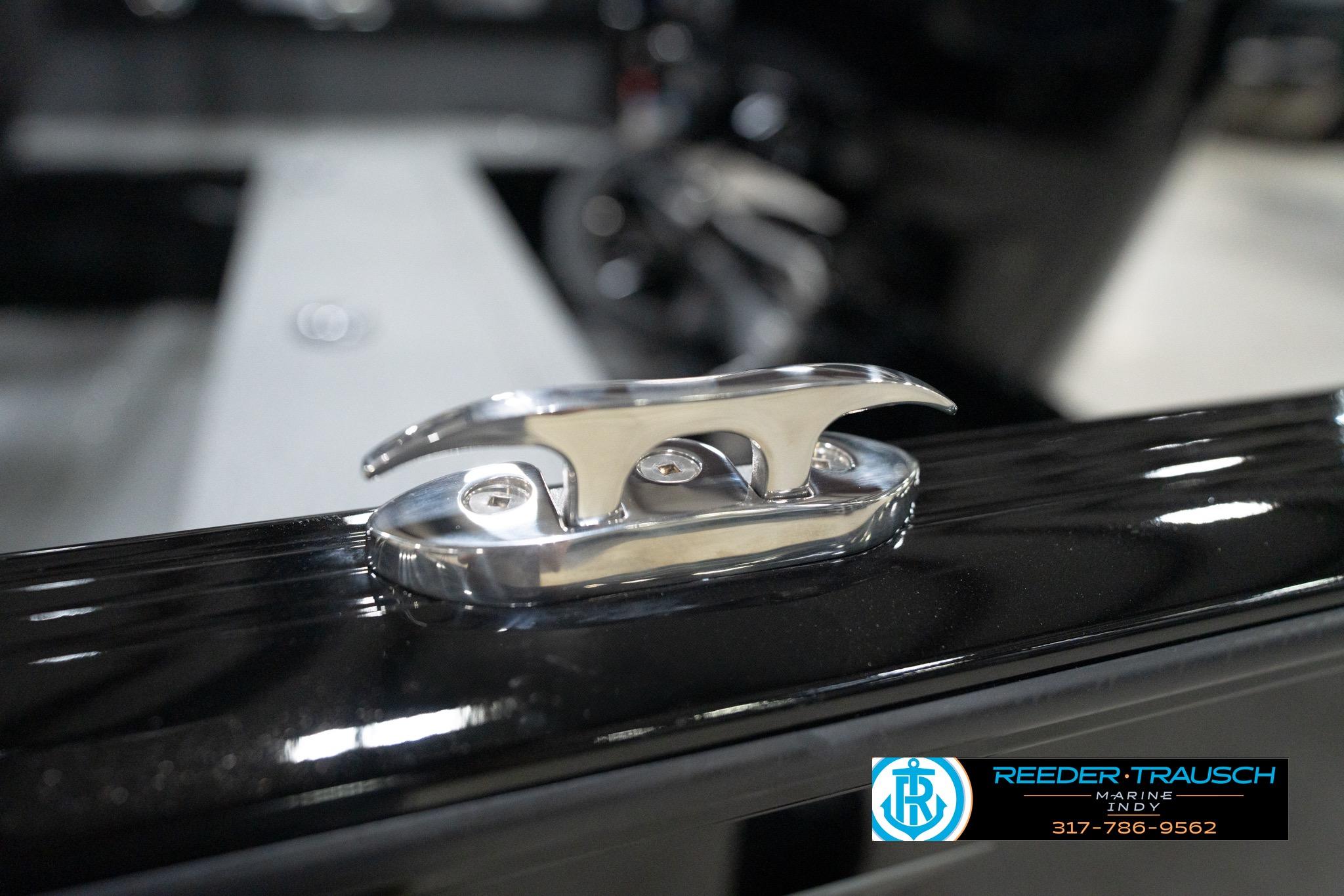 2026 Lund 1800 Explorer Sport boat cleat detail, shiny metal finish.