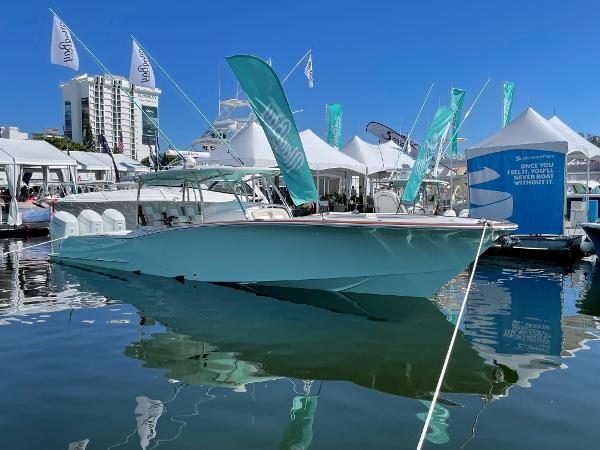 2025 Mag Bay 43 Center Console boat displayed at a marina event.