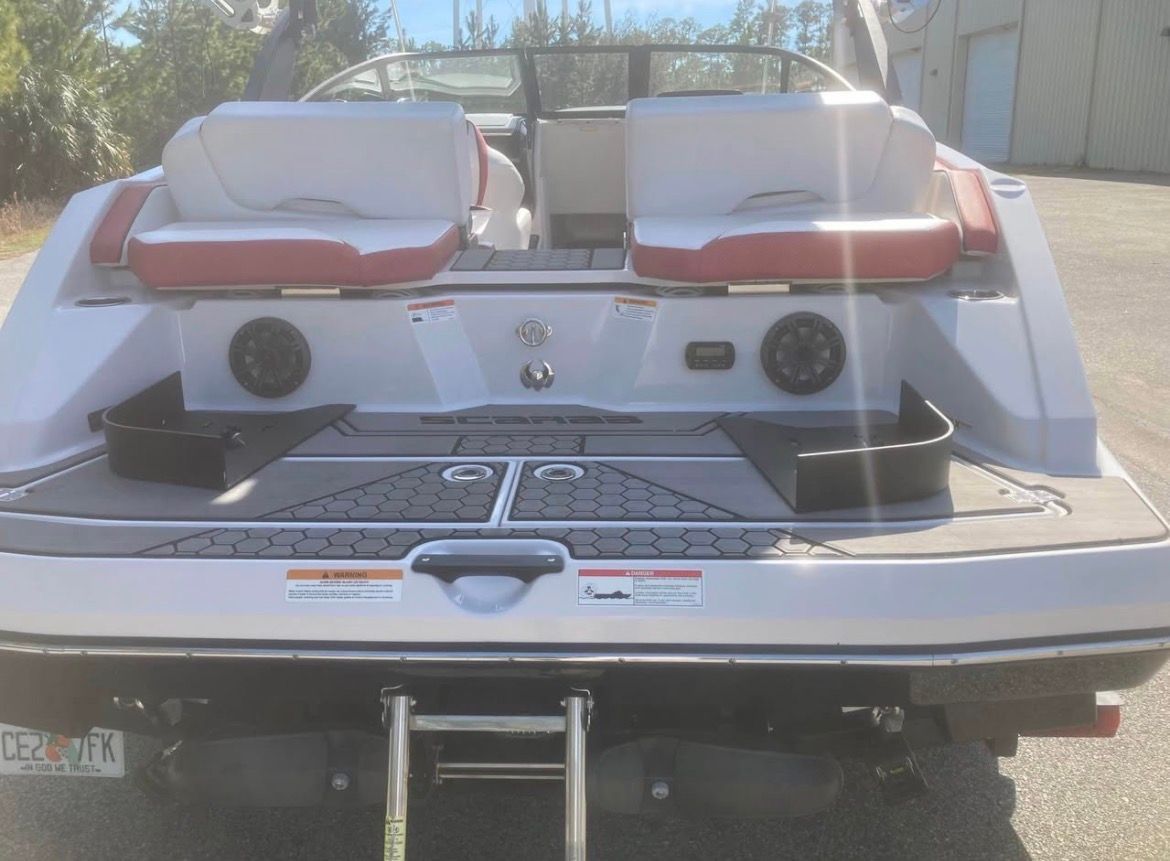 Rear view of a 2017 Scarab 215 boat with two seats and speakers.