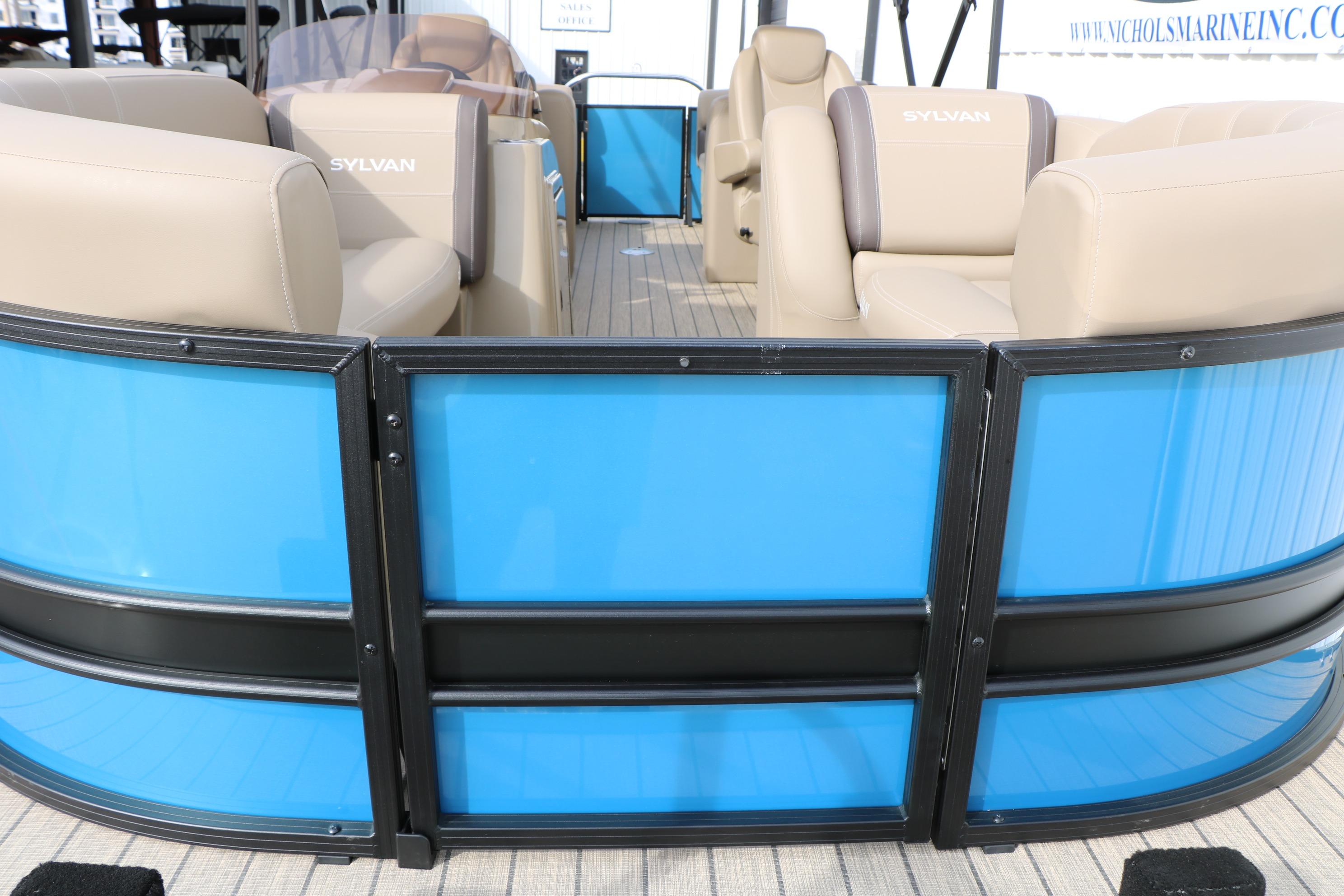 2026 Sylvan Mirage 822 LZ pontoon boat with beige seating and blue paneling.