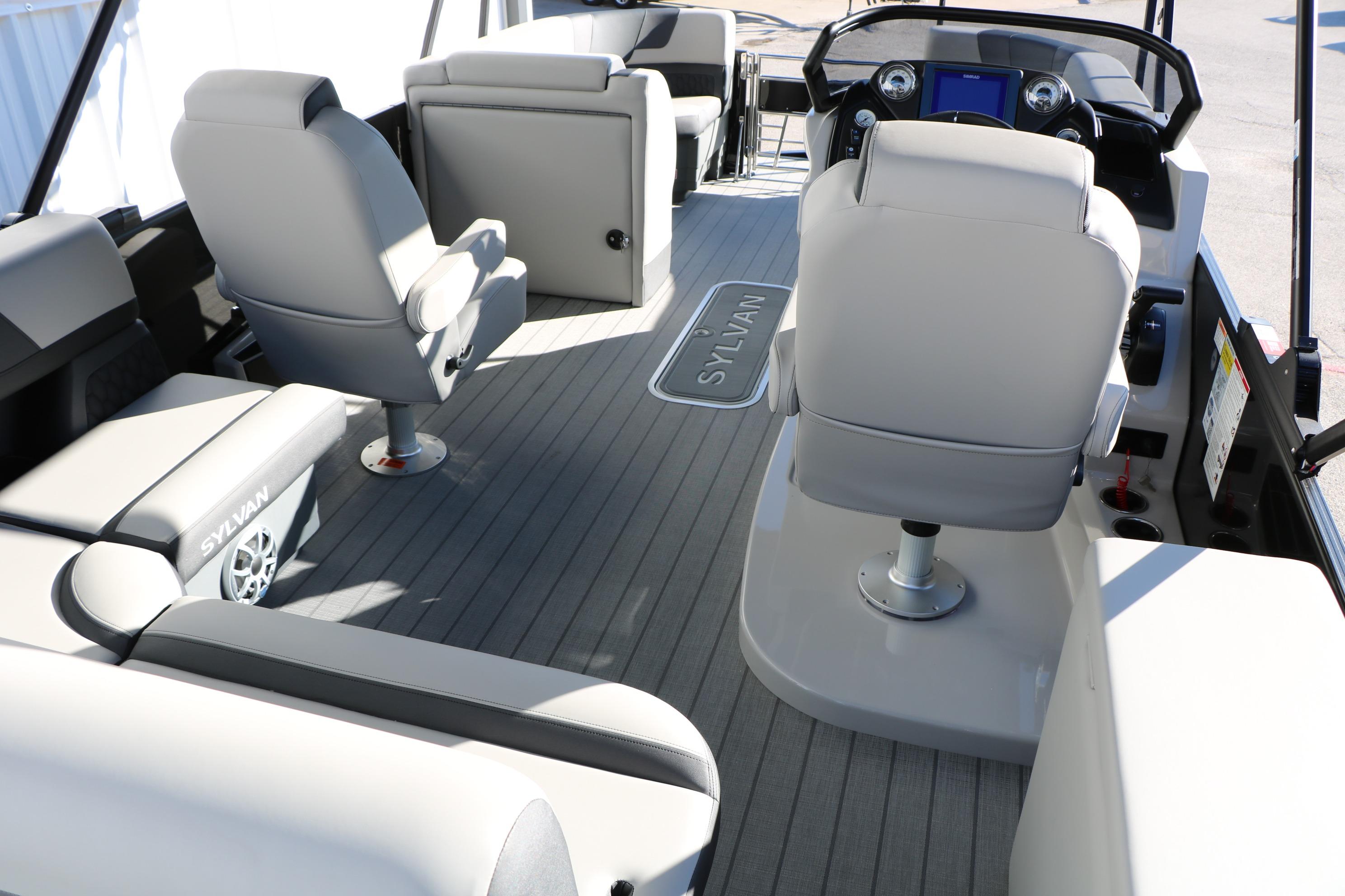 Interior of 2026 Sylvan L3 CLZ DH boat with modern seating and dashboard.