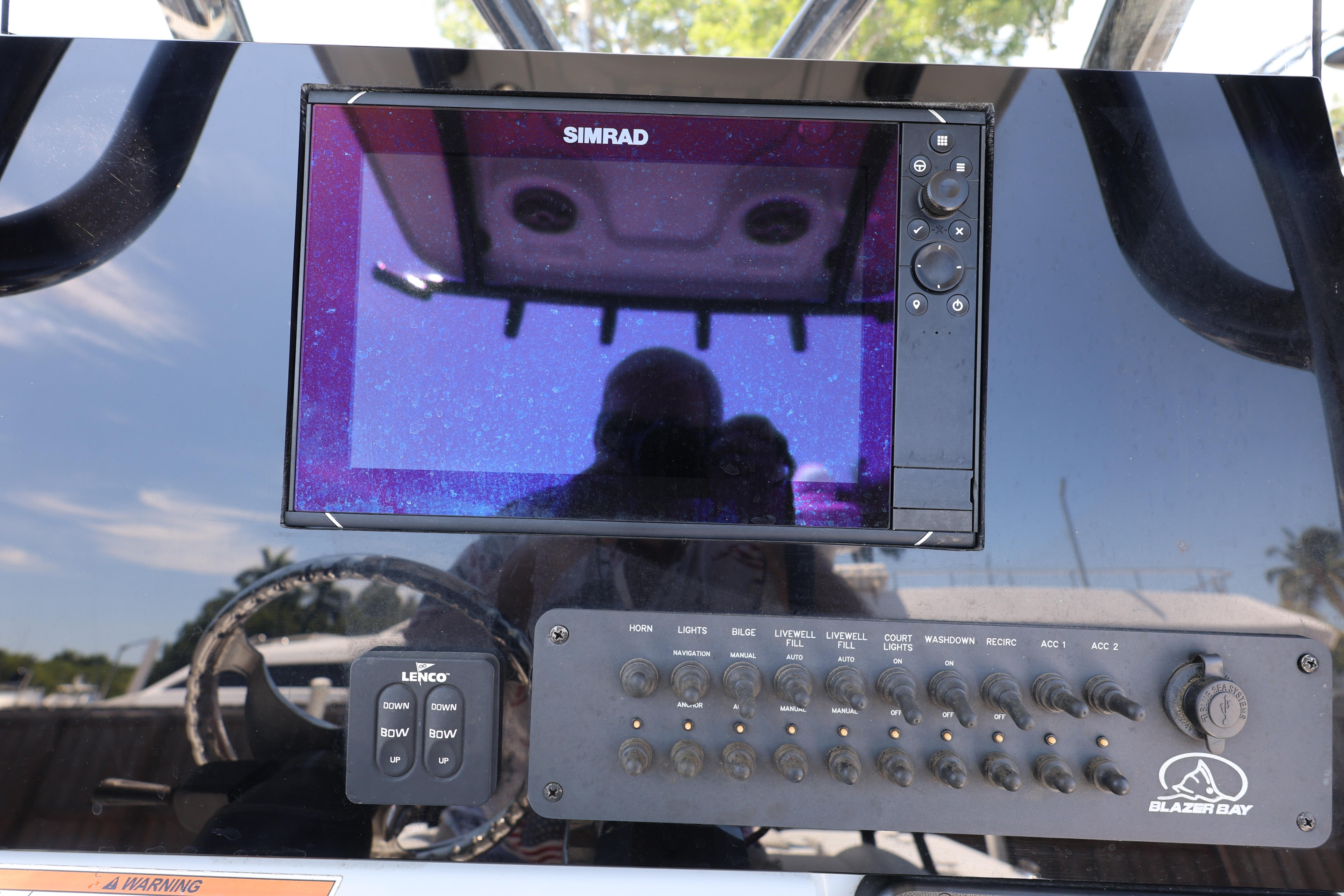 Control panel of a 2021 Blazer Bay 2400 boat with Simrad display.