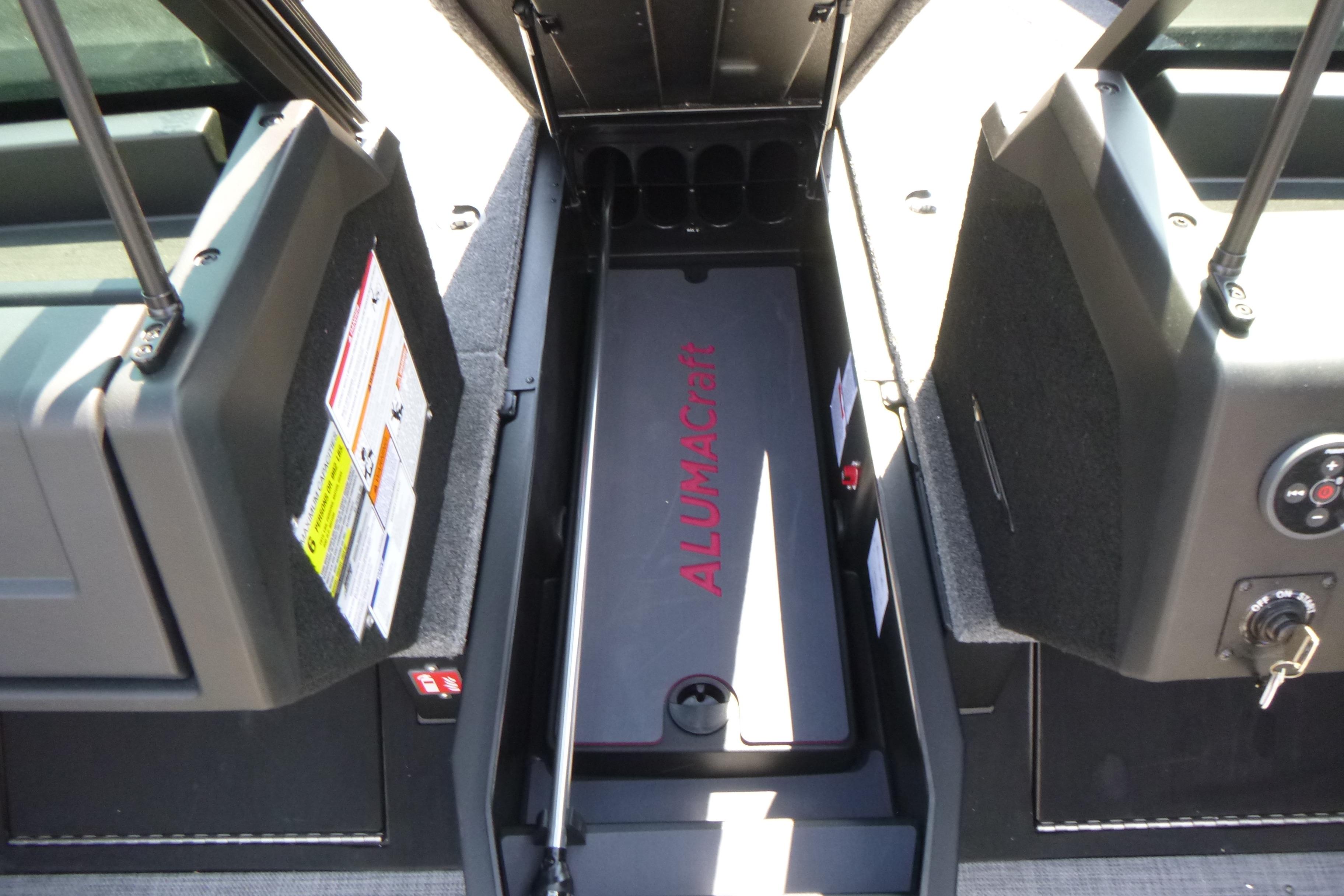 2025 Alumacraft Trophy 185X Sport boat storage compartment with Alumacraft branding.
