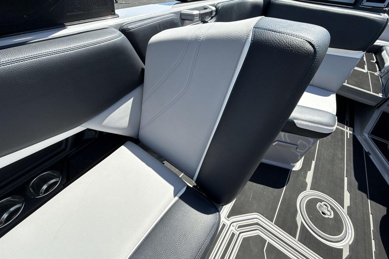 2023 Supra SE 550 boat interior with sleek black and white seating design.