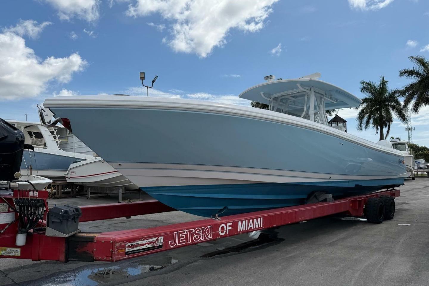 2020 Intrepid 375 Nomad SE boat on trailer, clear sky background.