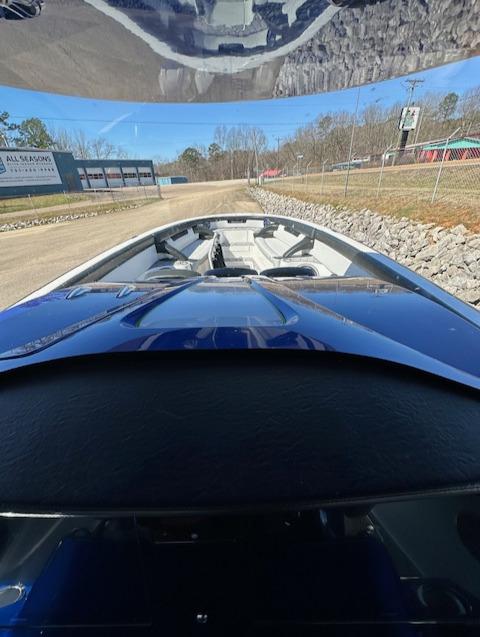 2019 Mystic Powerboats M4200, sleek design, docked on a sunny day.