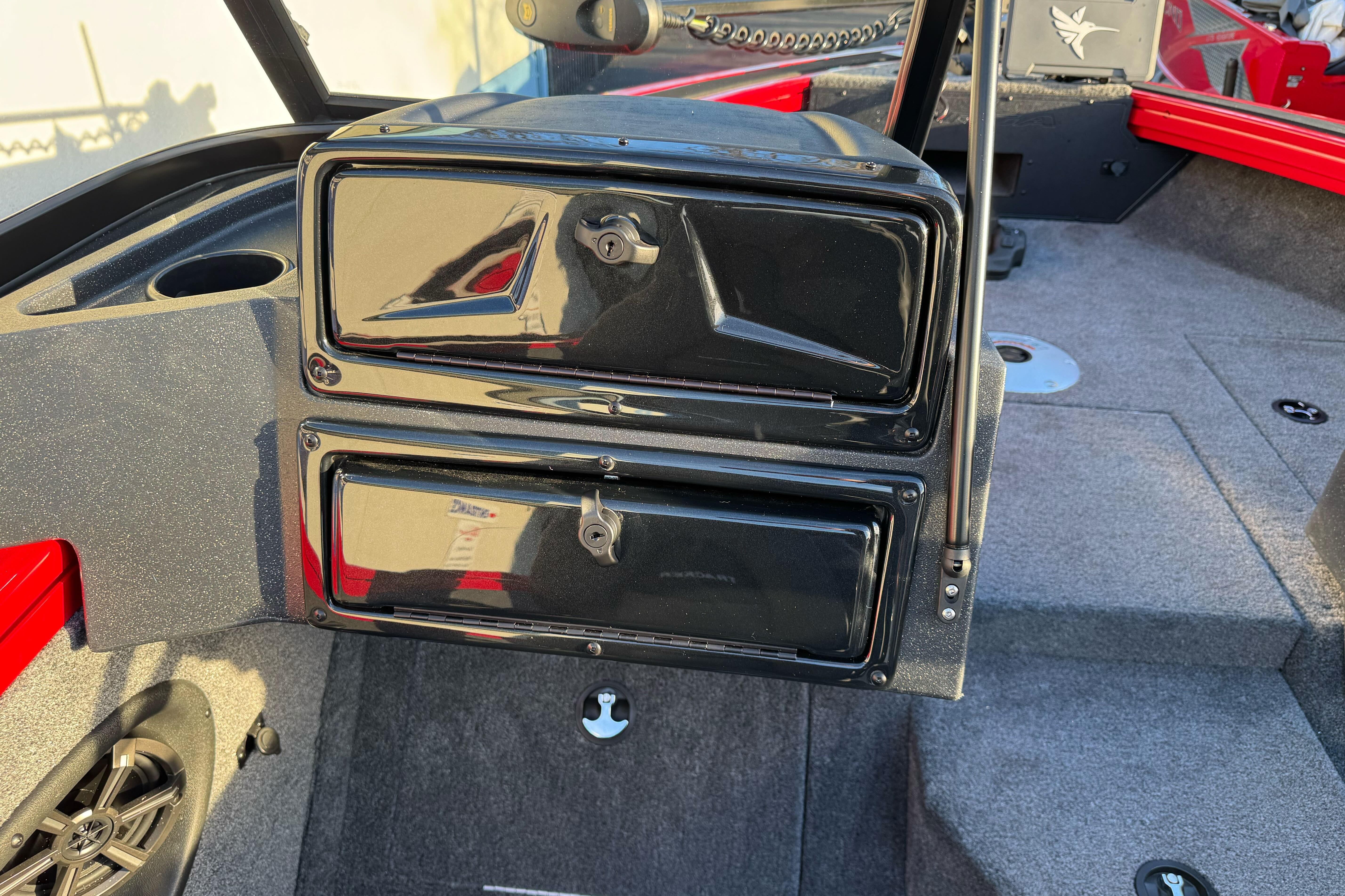 2026 Tracker Targa V-18 WT boat interior with storage compartments and speaker.