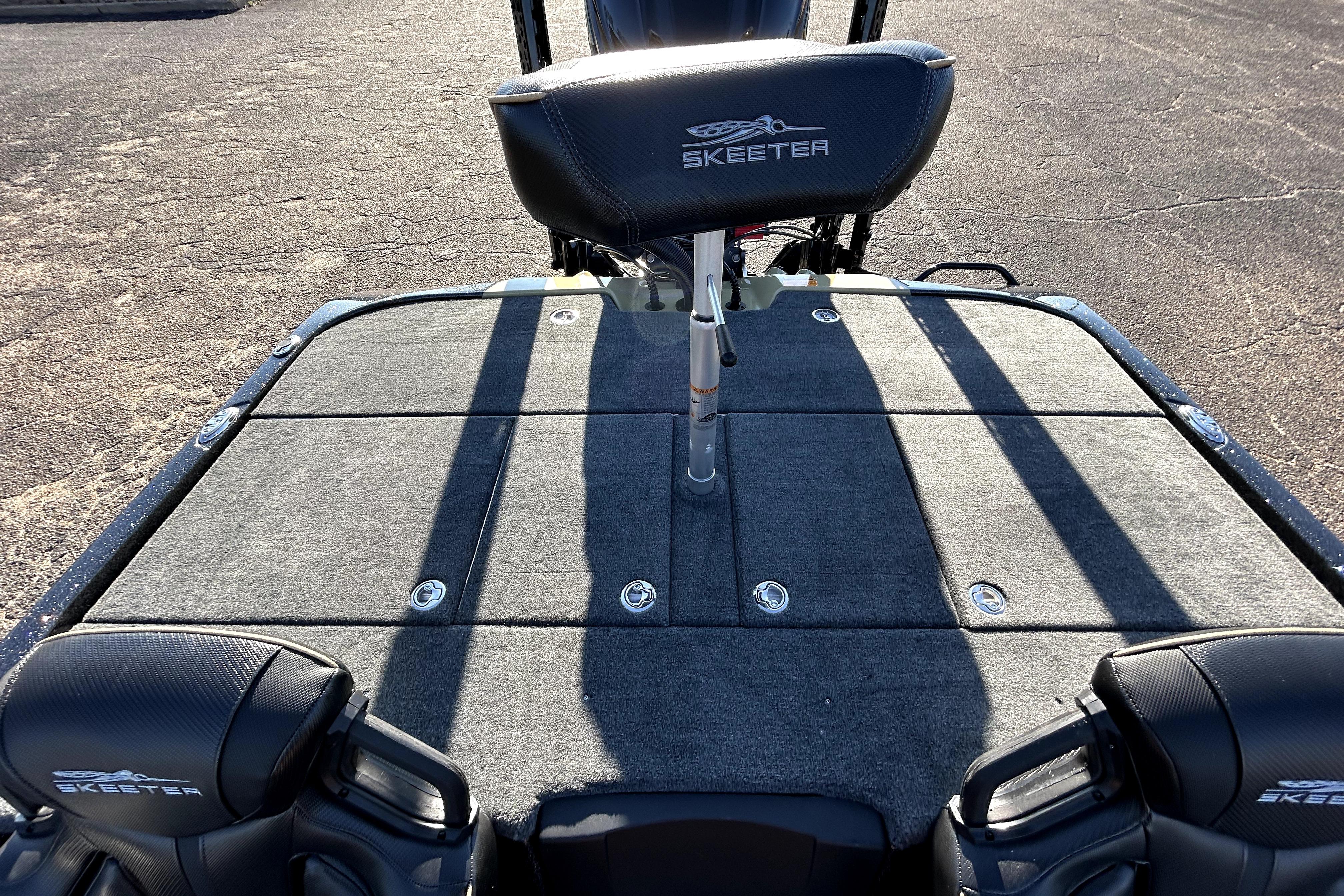 2026 Skeeter ZXE21 boat deck with seating and storage compartments.