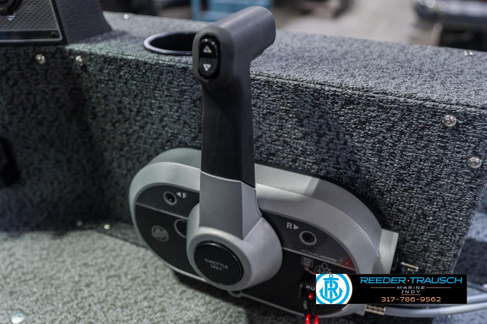 Throttle control of 2026 Lund 1700 Explorer Sport boat, featuring textured panel.